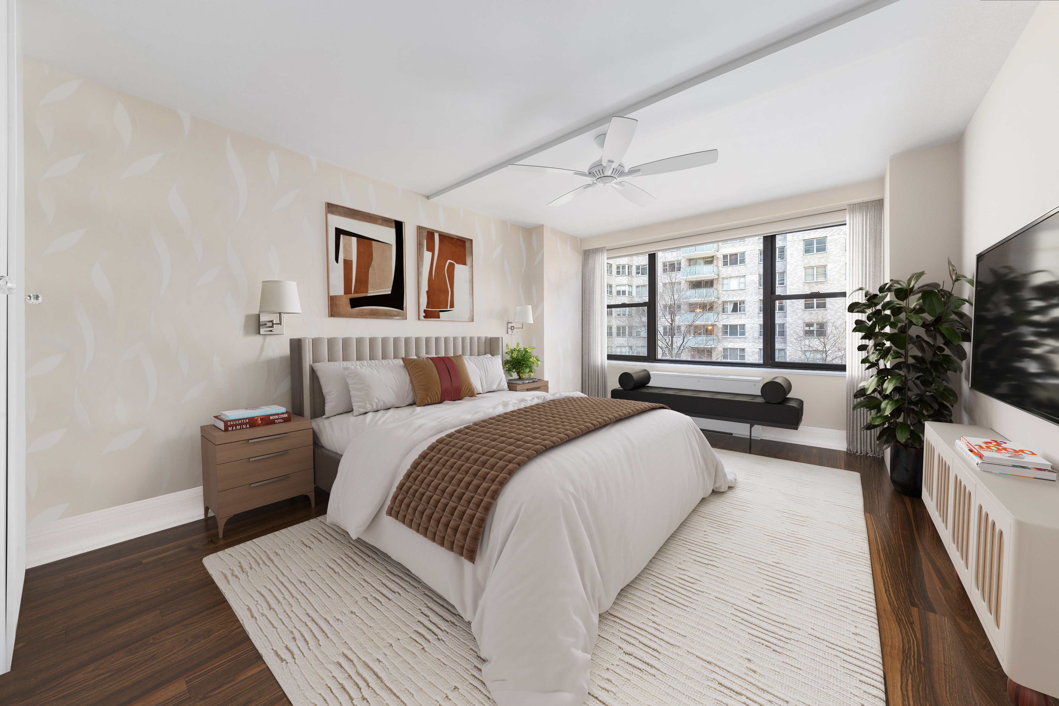 305 East 40th Street, Unit 5K Manhattan, NY 10016 - Photo 6 of 15 a bedroom with a large bed and a potted plant