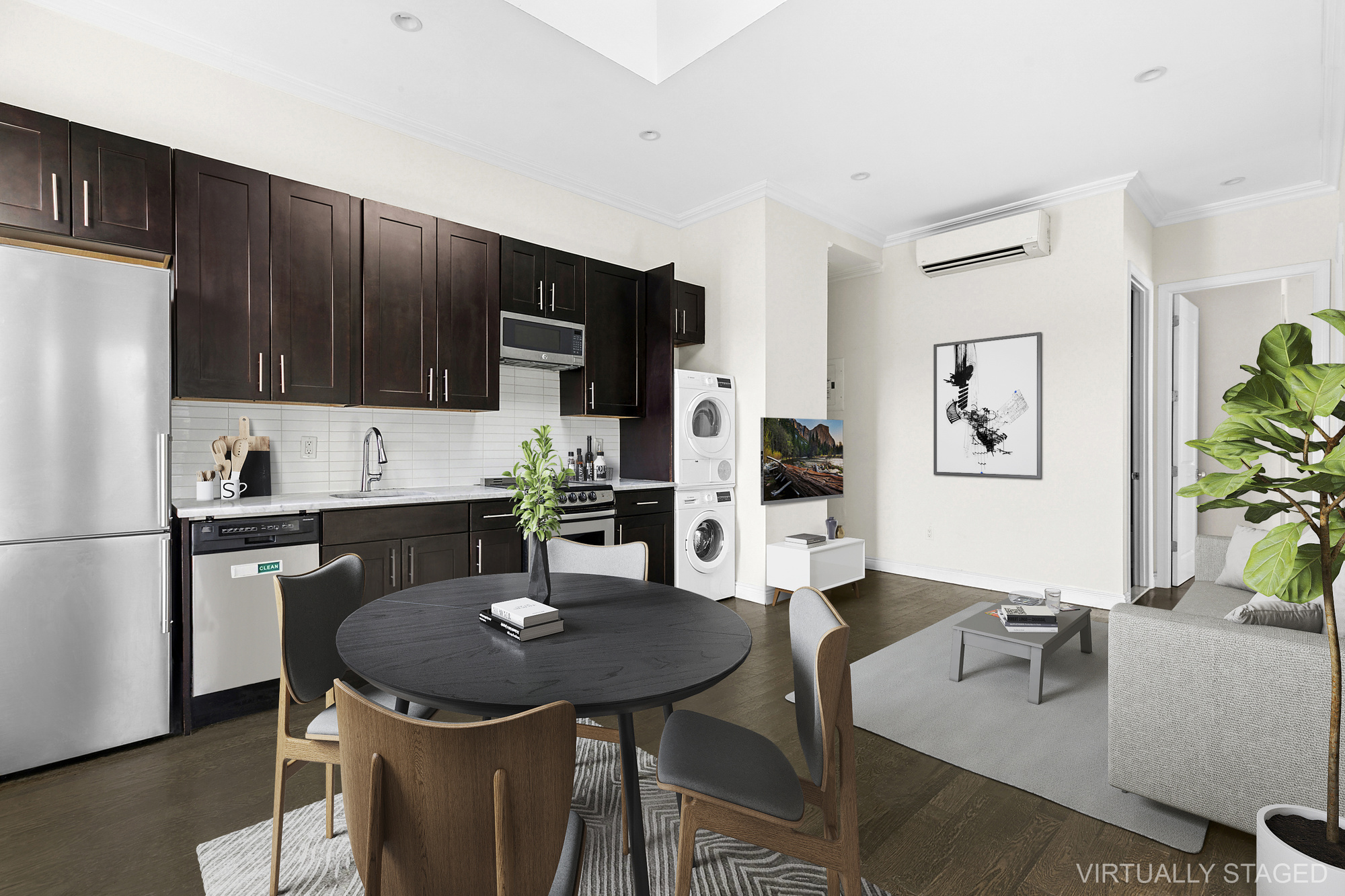 a kitchen with a refrigerator a stove a microwave a dining table and chairs