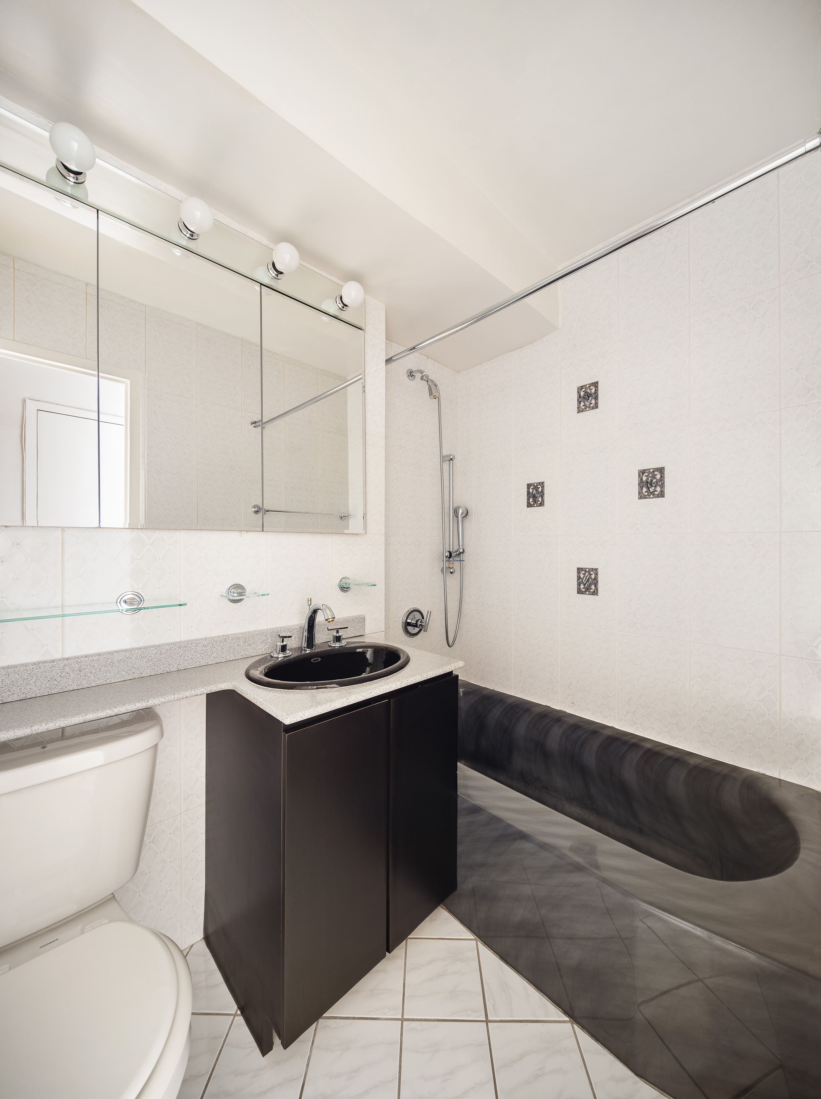 900 West 190th Street, Unit 10O Manhattan, NY 10040 - Photo 8 of 15 a bathroom with a sink a toilet and bathtub