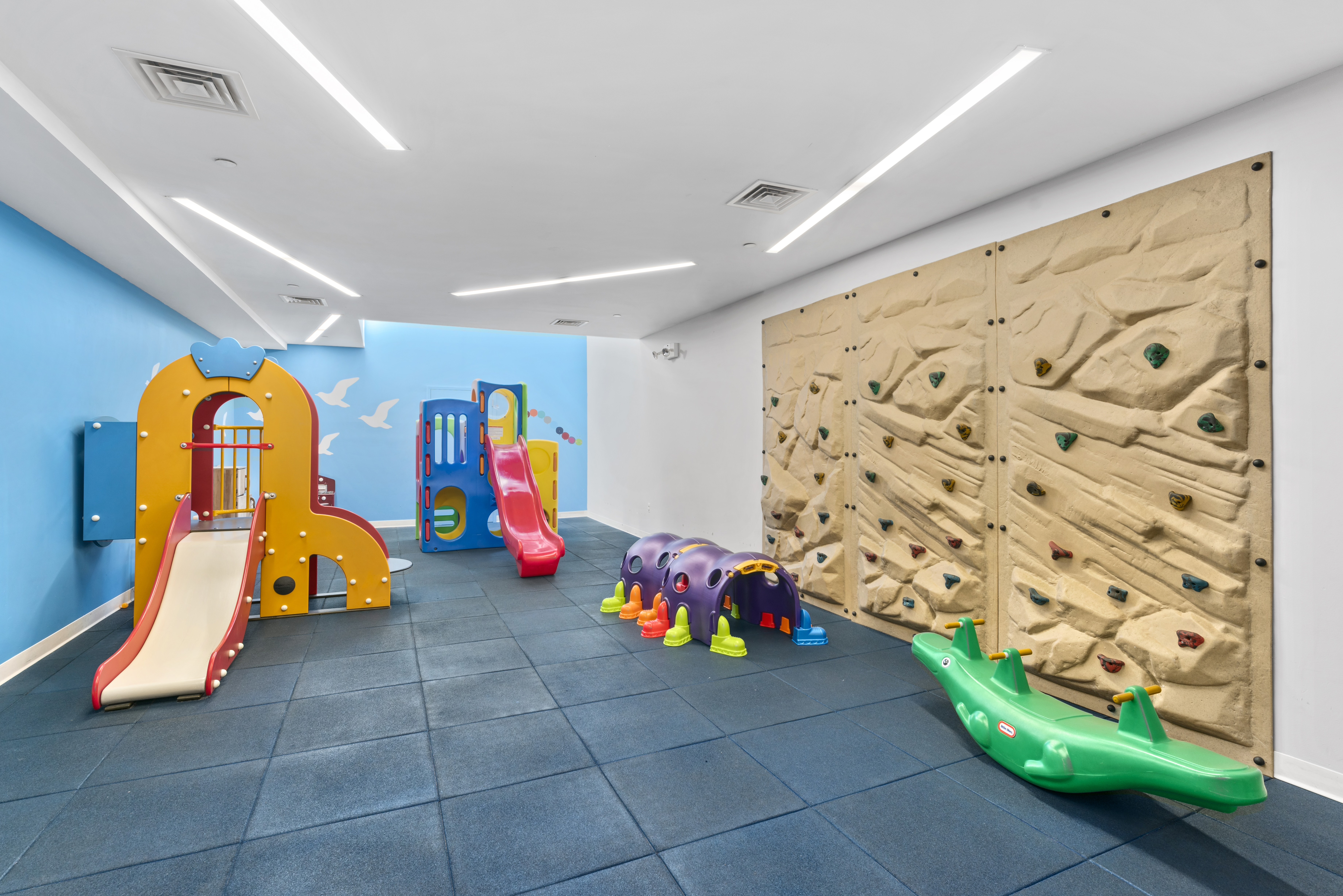 255 East 74th Street, Unit 21B Manhattan, NY 10021 - Photo 38 of 40 a play room with toys
