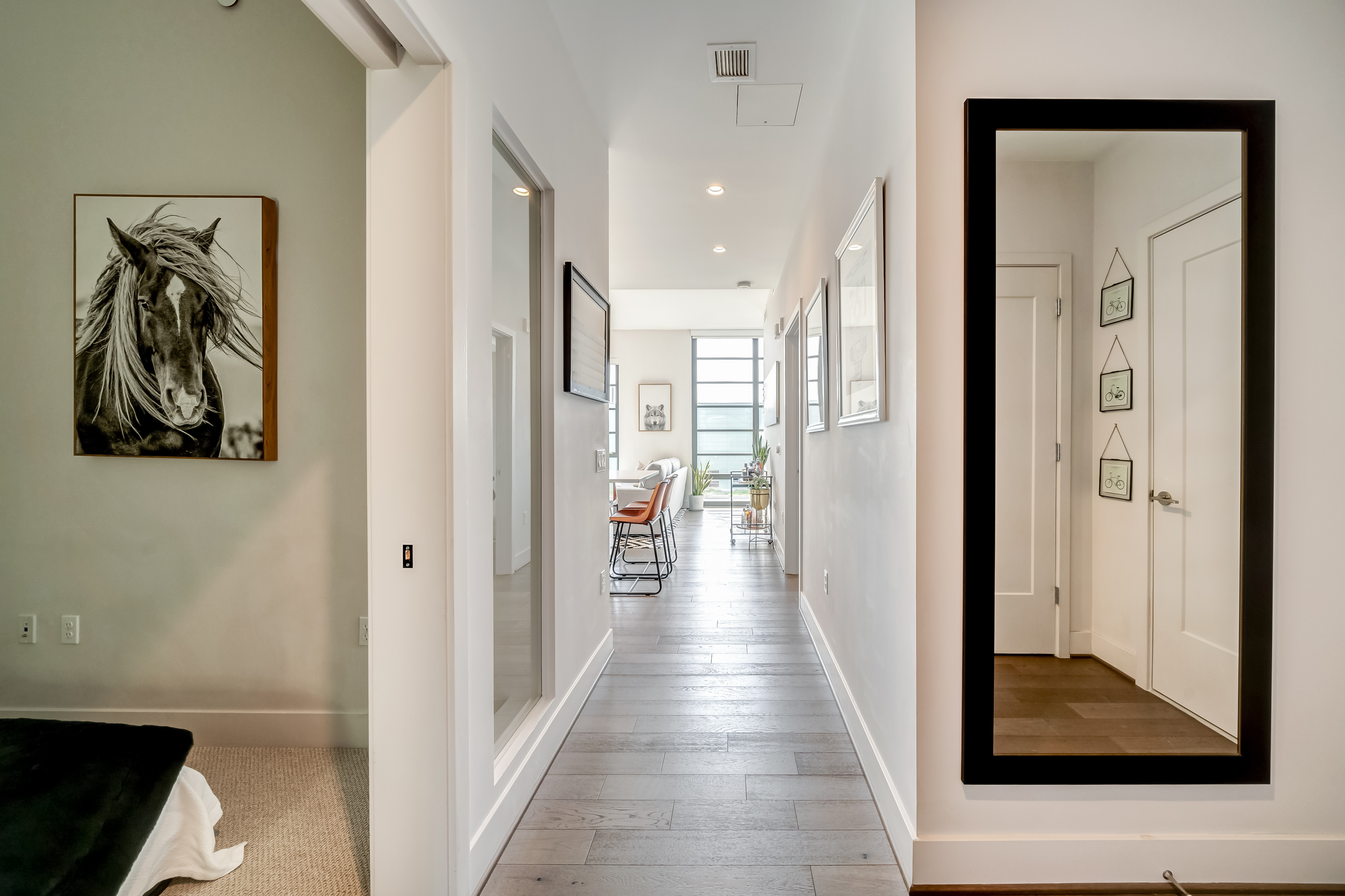 45 Sutton Square Southwest, Unit PH10 Washington, DC 20024 - Photo 5 of 44 a hallway with wooden floor and closet