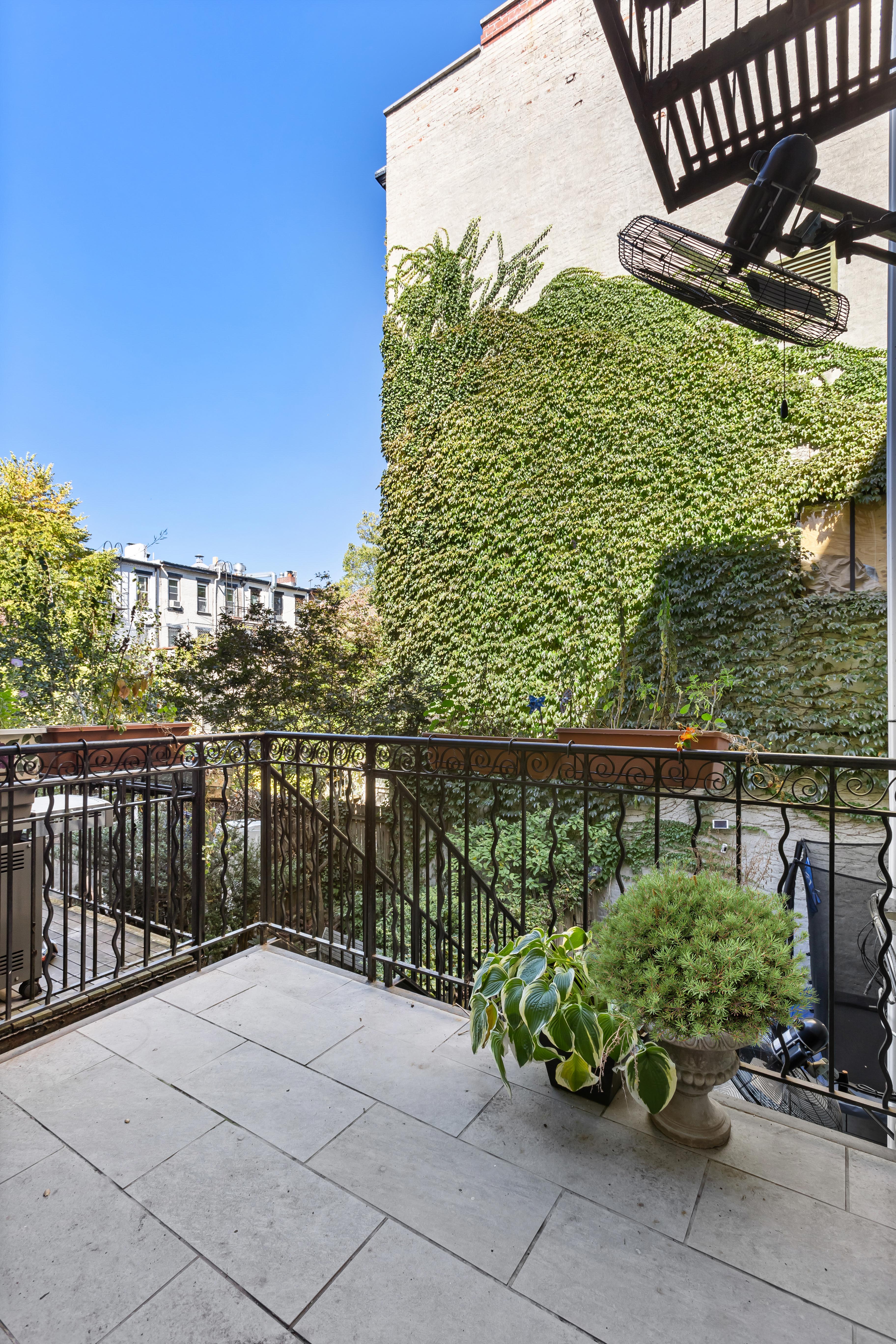227 Garfield Place, Unit Garden Duplex Brooklyn, NY 11215 - Photo 3 of 15 a balcony with trees in the background