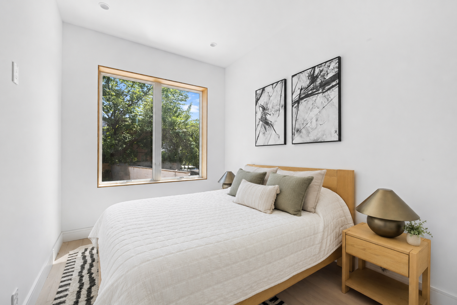 810 Sterling Place, Unit 2 Brooklyn, NY 11216 - Photo 8 of 10 a bedroom with a bed and window