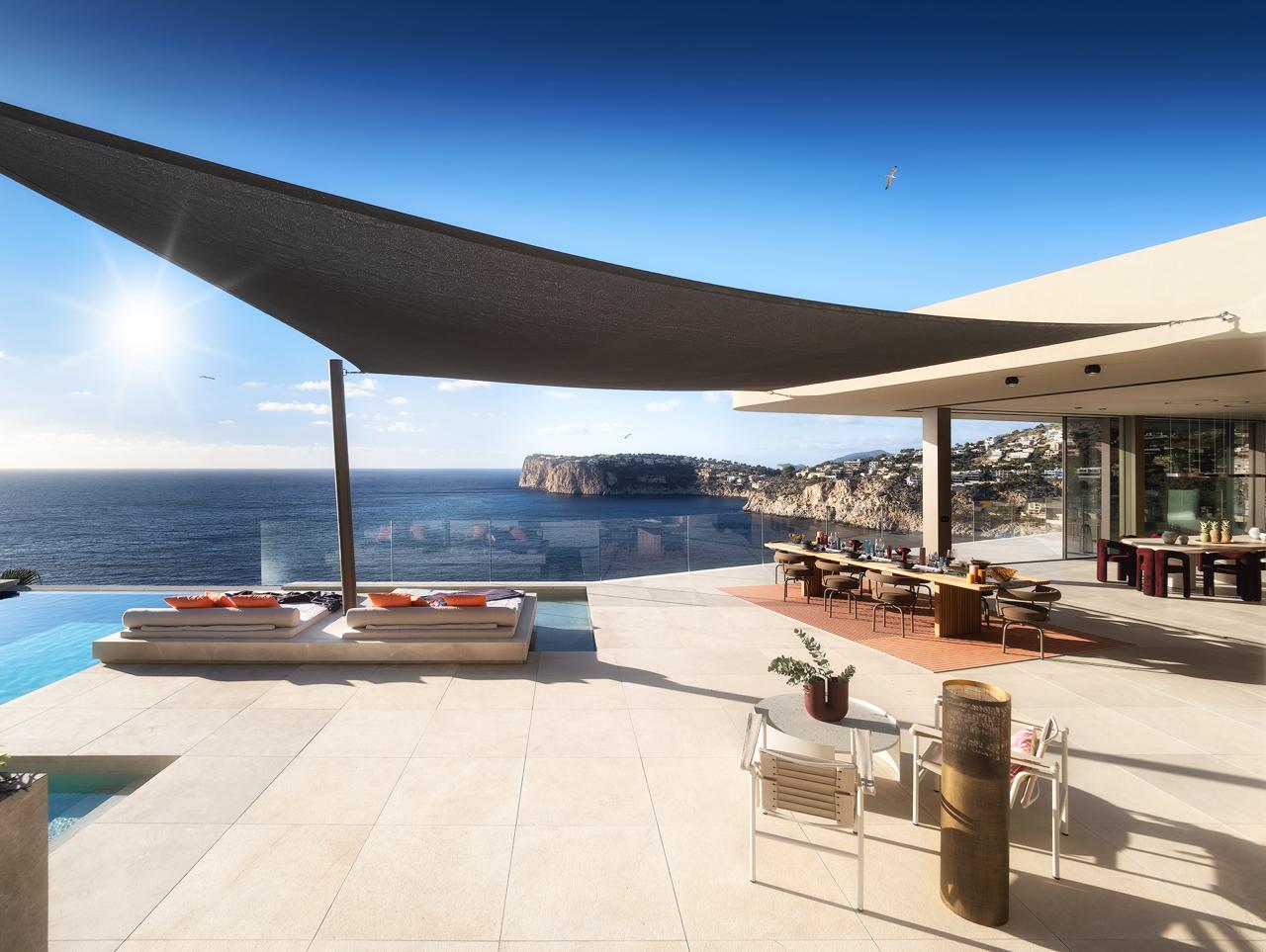 Private Address Andratx, Mallorca Spain, IB 07157 - Photo 2 of 17 a view of a swimming pool with lounge chairs in patio