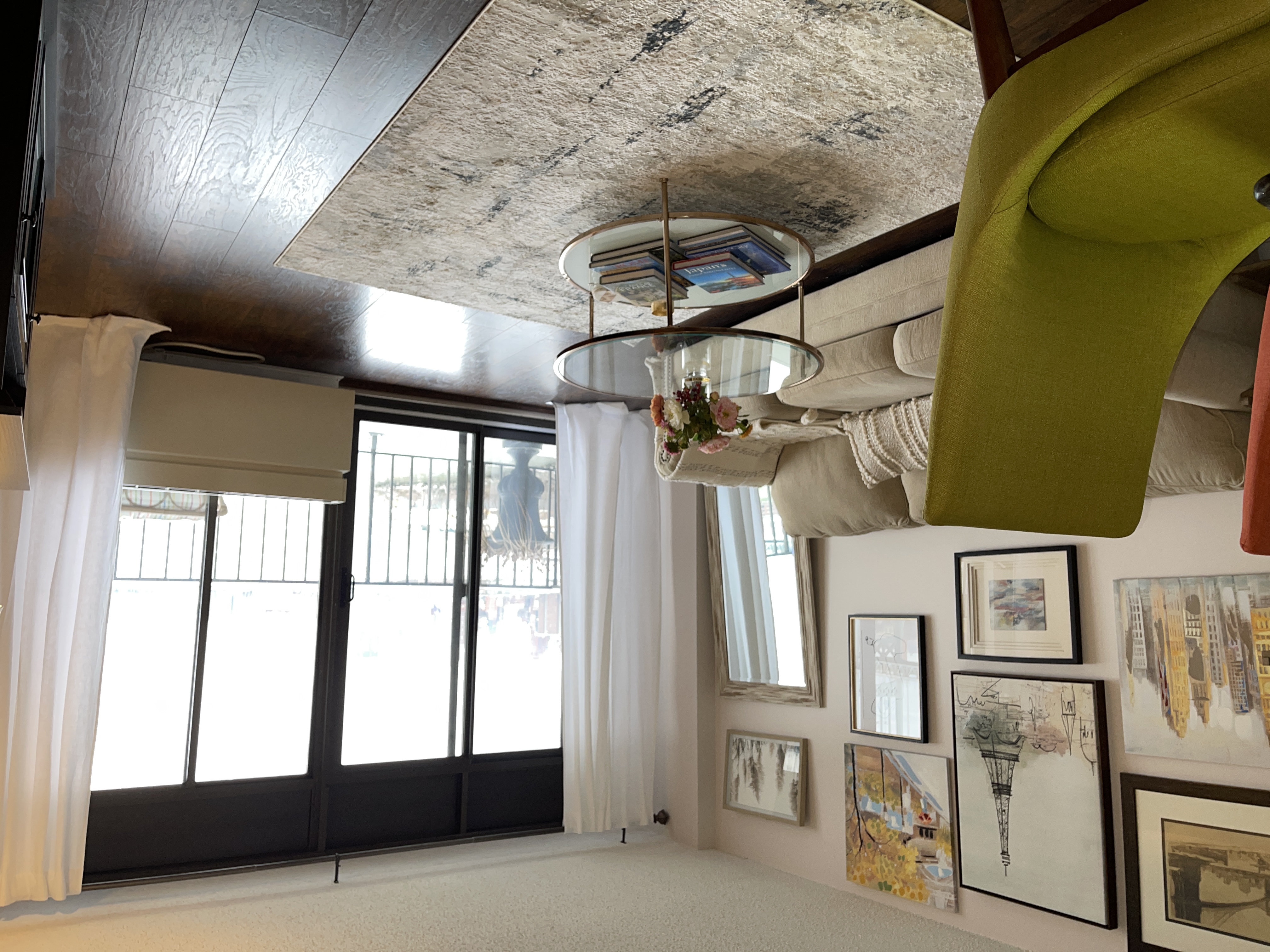 25-40 Shore Boulevard, Unit 8T Queens, NY 11102 - Photo 3 of 23 a living room with furniture and a large window