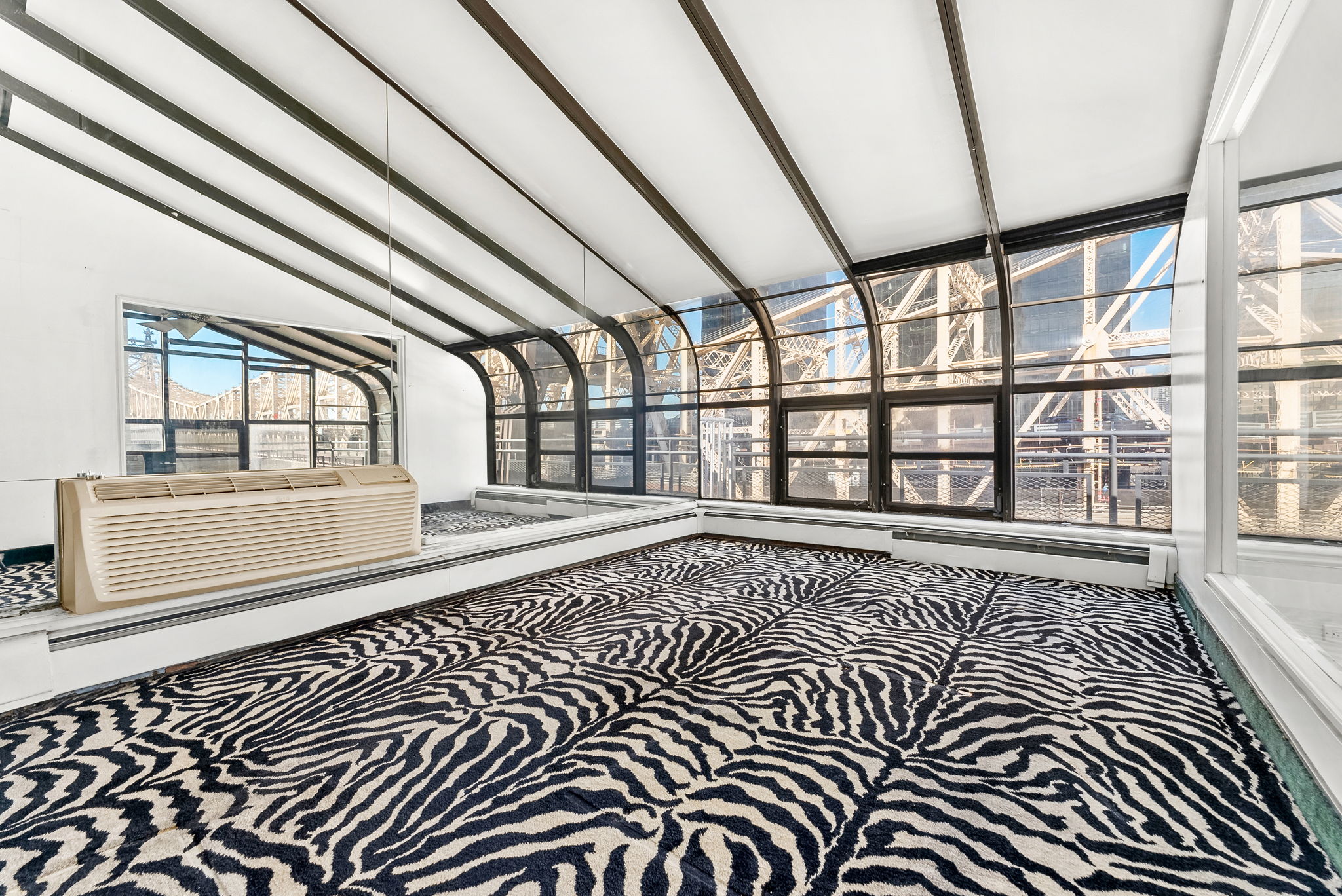 40 Sutton Place, Unit 10M Manhattan, NY 10022 - Photo 9 of 10 a view of a black and white checkered floor
