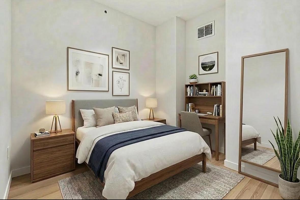160 Water Street, Unit 3M Manhattan, NY 10038 - Photo 8 of 21 a bedroom with a bed and painting on the wall