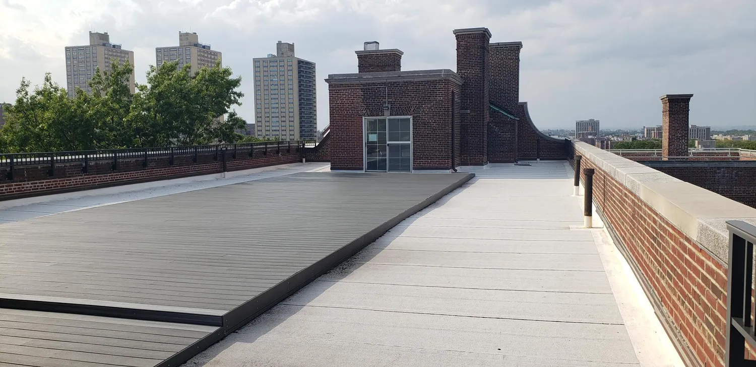 a view of balcony with furniture