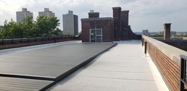a view of balcony with furniture