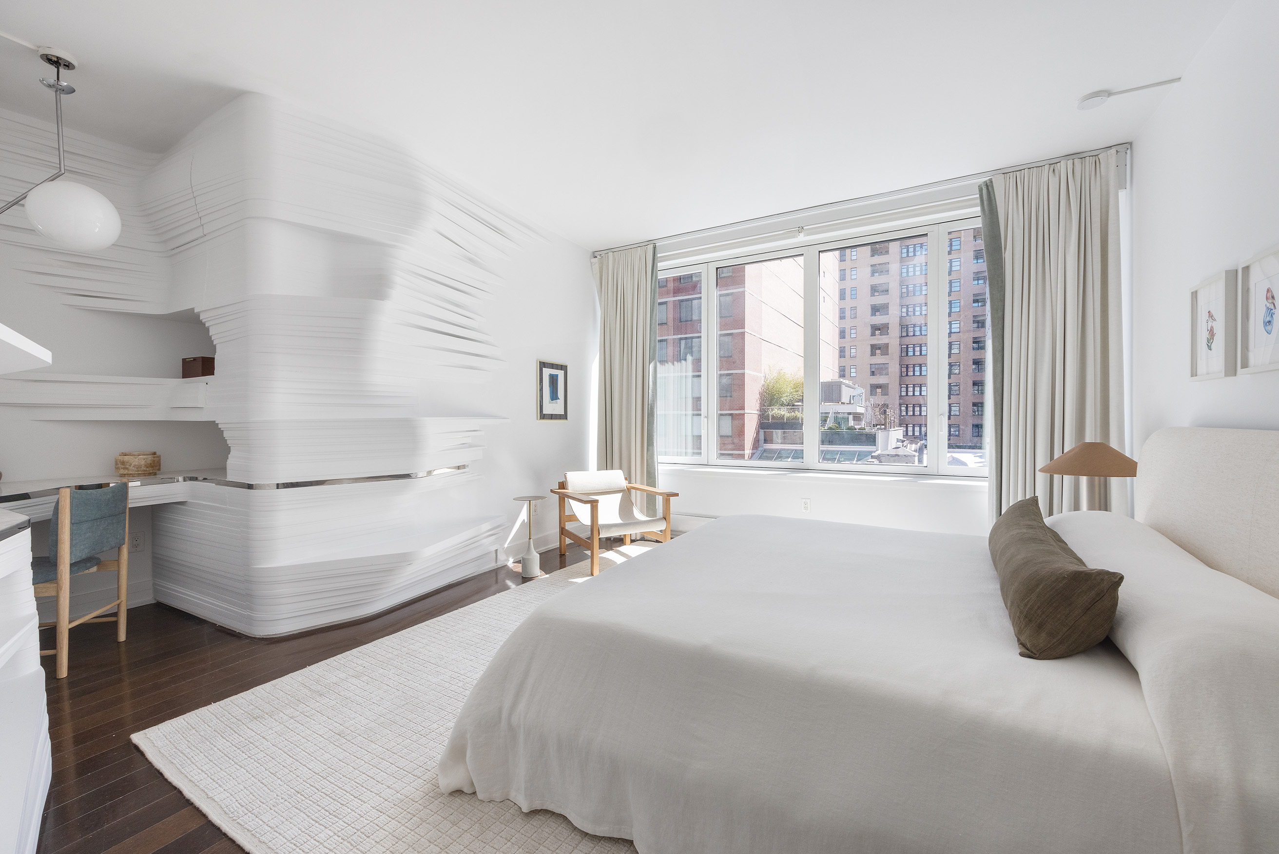 5 Franklin Place, Unit 9D Manhattan, NY 10013 - Photo 7 of 20 a spacious bedroom with a bed and a large window