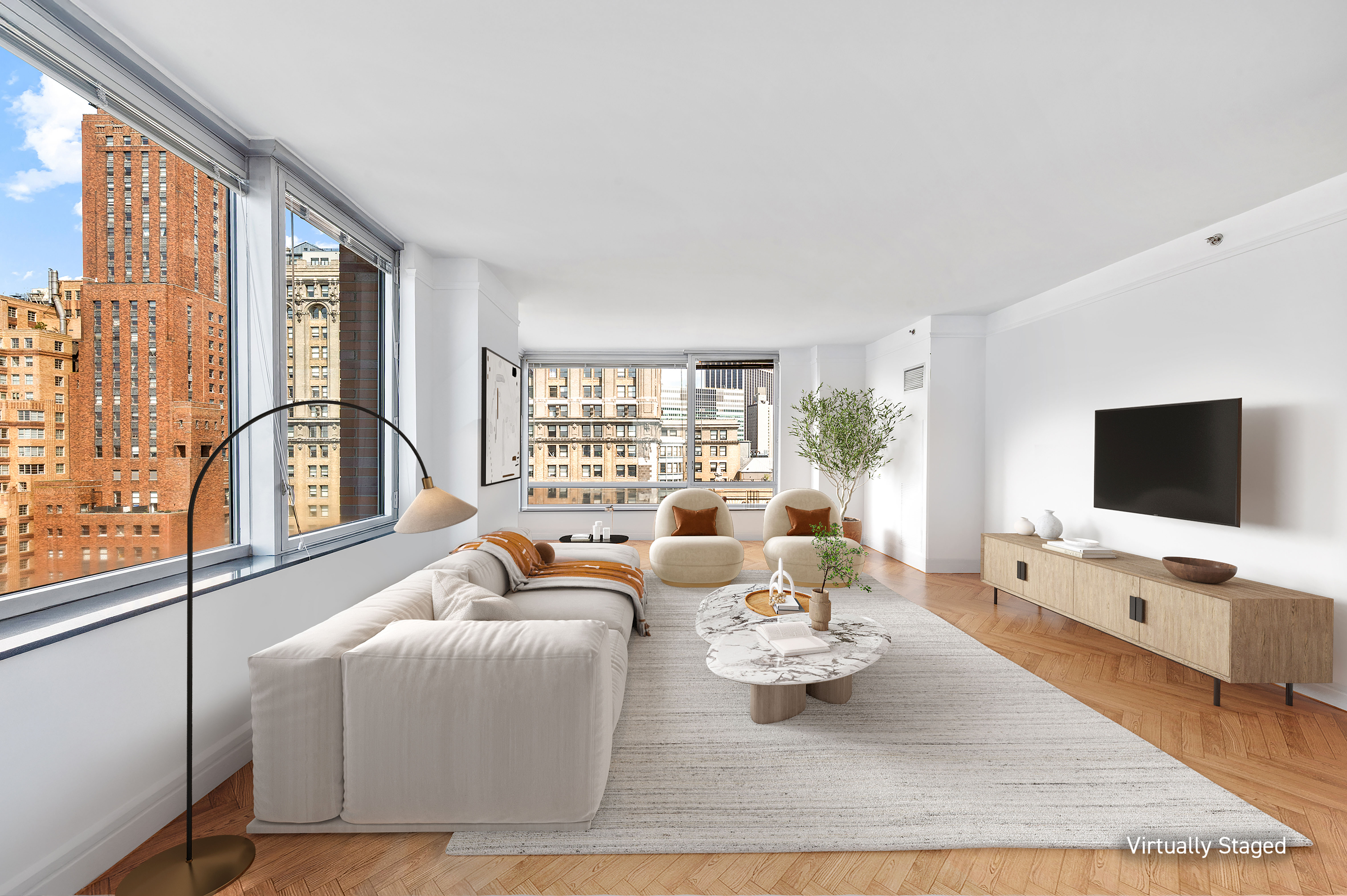 10 West Street, Unit 28C Manhattan, NY 10004 - Photo 4 of 12 a living room with furniture flat screen tv and a large window