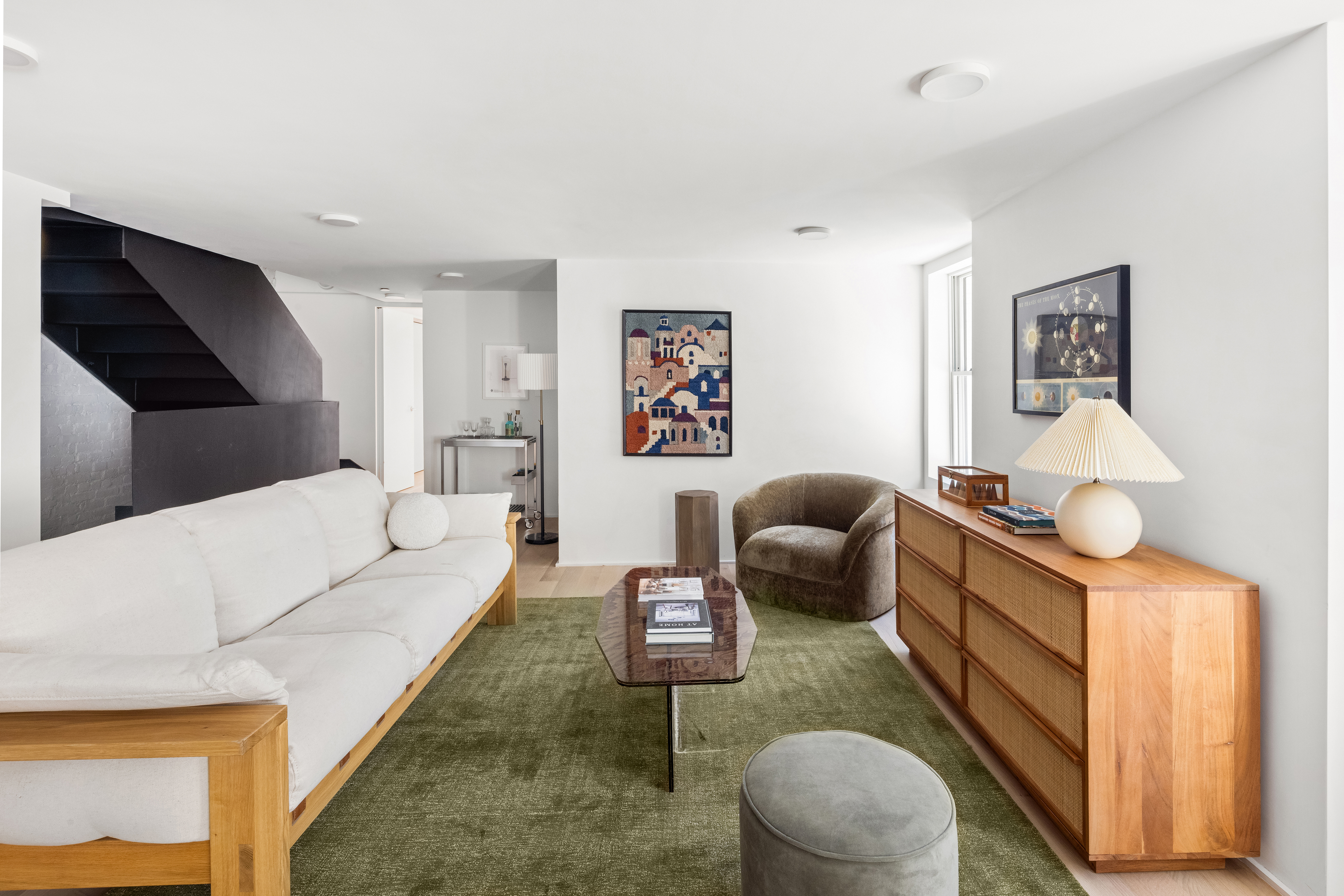 61 South 4th Street Brooklyn, NY 11249 - Photo 8 of 29 a living room with furniture and a rug