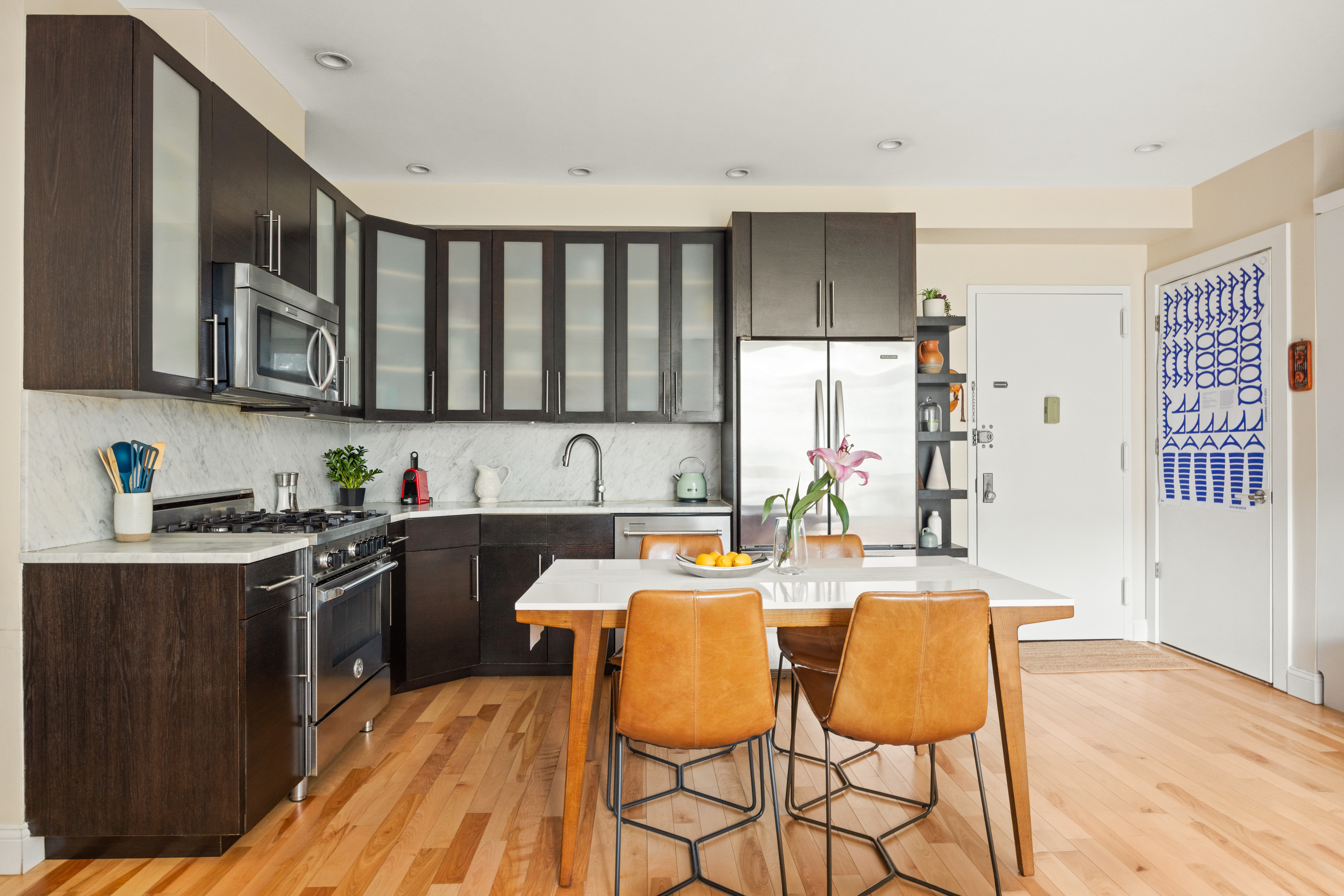 35 McDonald Avenue, Unit 1E Brooklyn, NY 11218 - Photo 4 of 9 a kitchen with stainless steel appliances granite countertop a sink and a stove