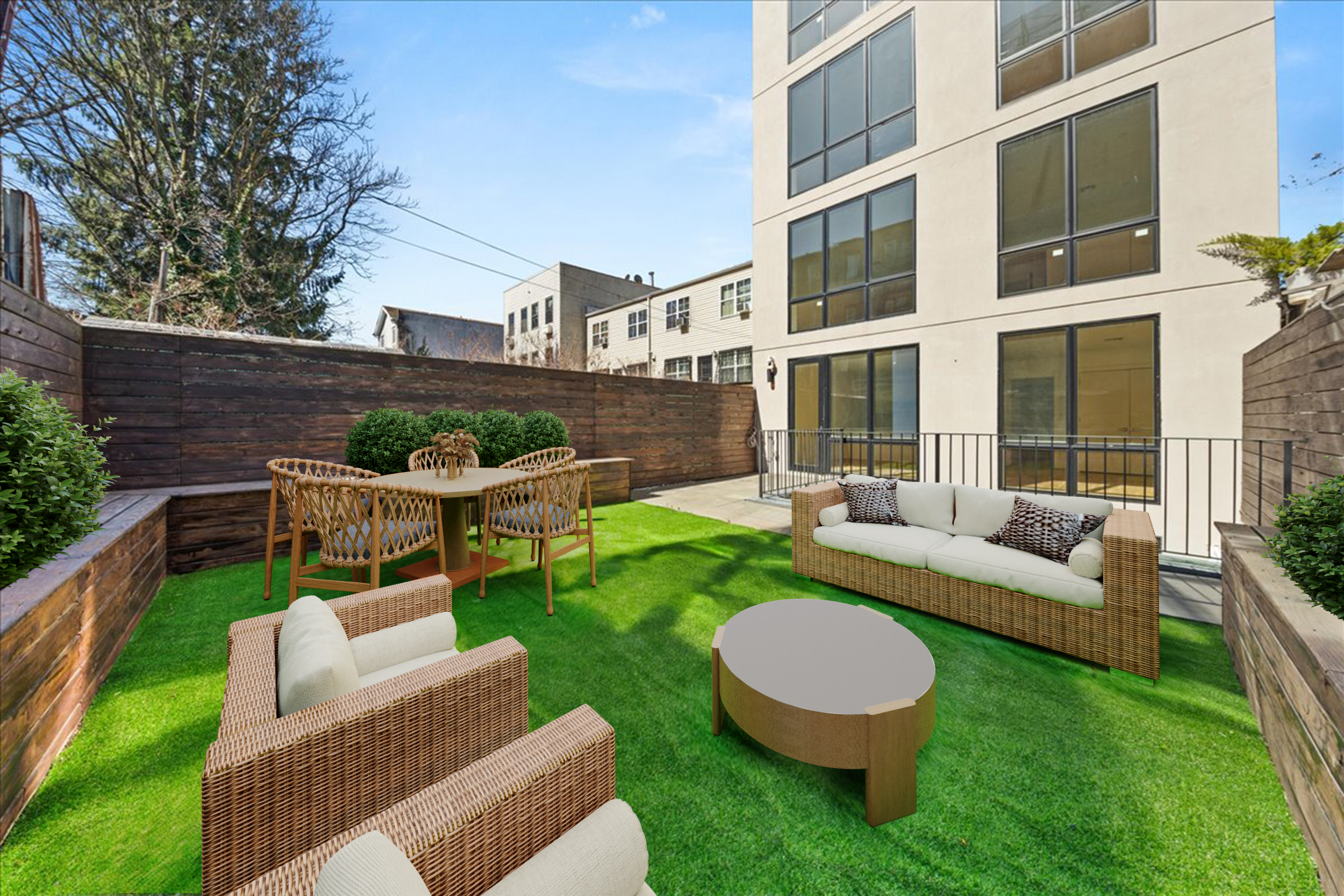 40 Schaefer Street, Unit 1B Brooklyn, NY 11207 - Photo 7 of 10 a view of a patio with couches chairs and a yard