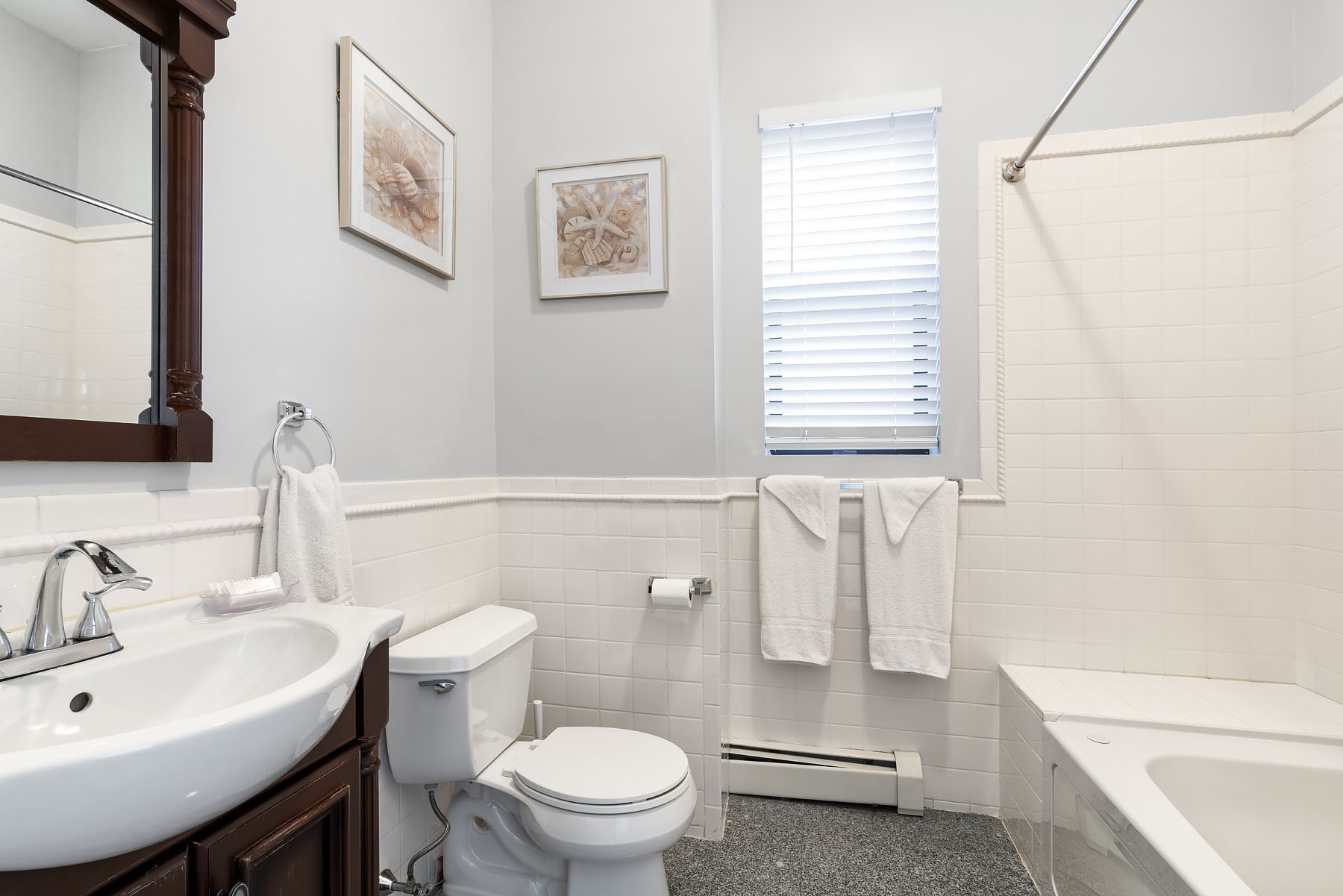 469 West 140th Street, Unit 2 Manhattan, NY 10031 - Photo 5 of 8 a bathroom with a sink a toilet and shower