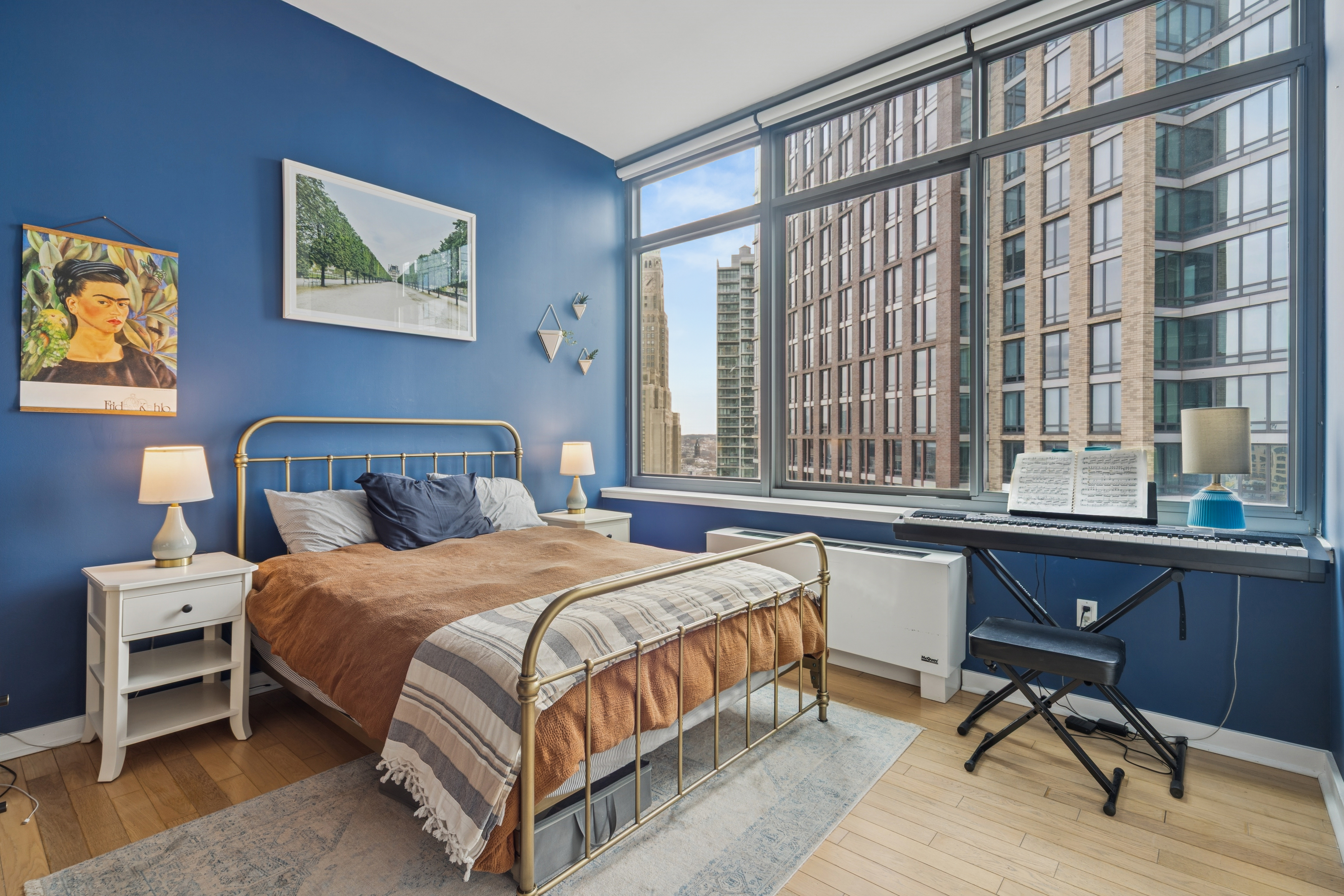 230 Ashland Place, Unit 22C Brooklyn, NY 11217 - Photo 5 of 13 a bedroom with a bed table chair and a window