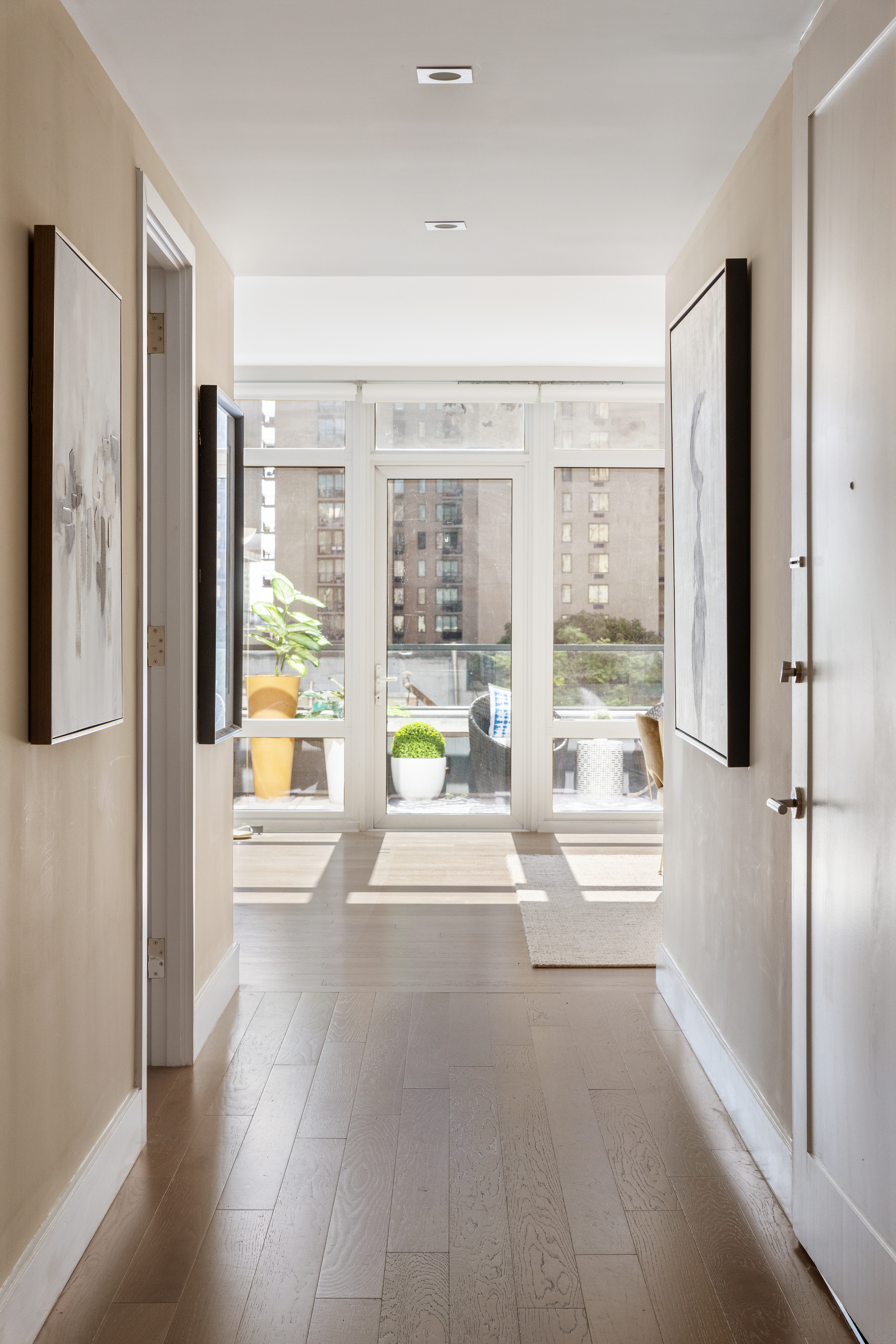 1355 1st Avenue, Unit 8 Manhattan, NY 10021 - Photo 13 of 25 a large white room with a large window and tub