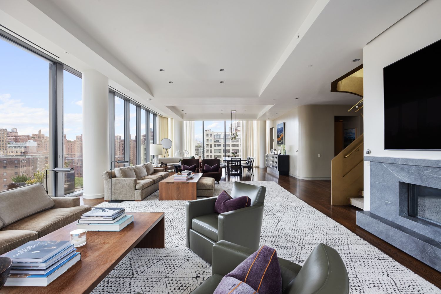 a very nice looking living room with furniture and a flat screen tv