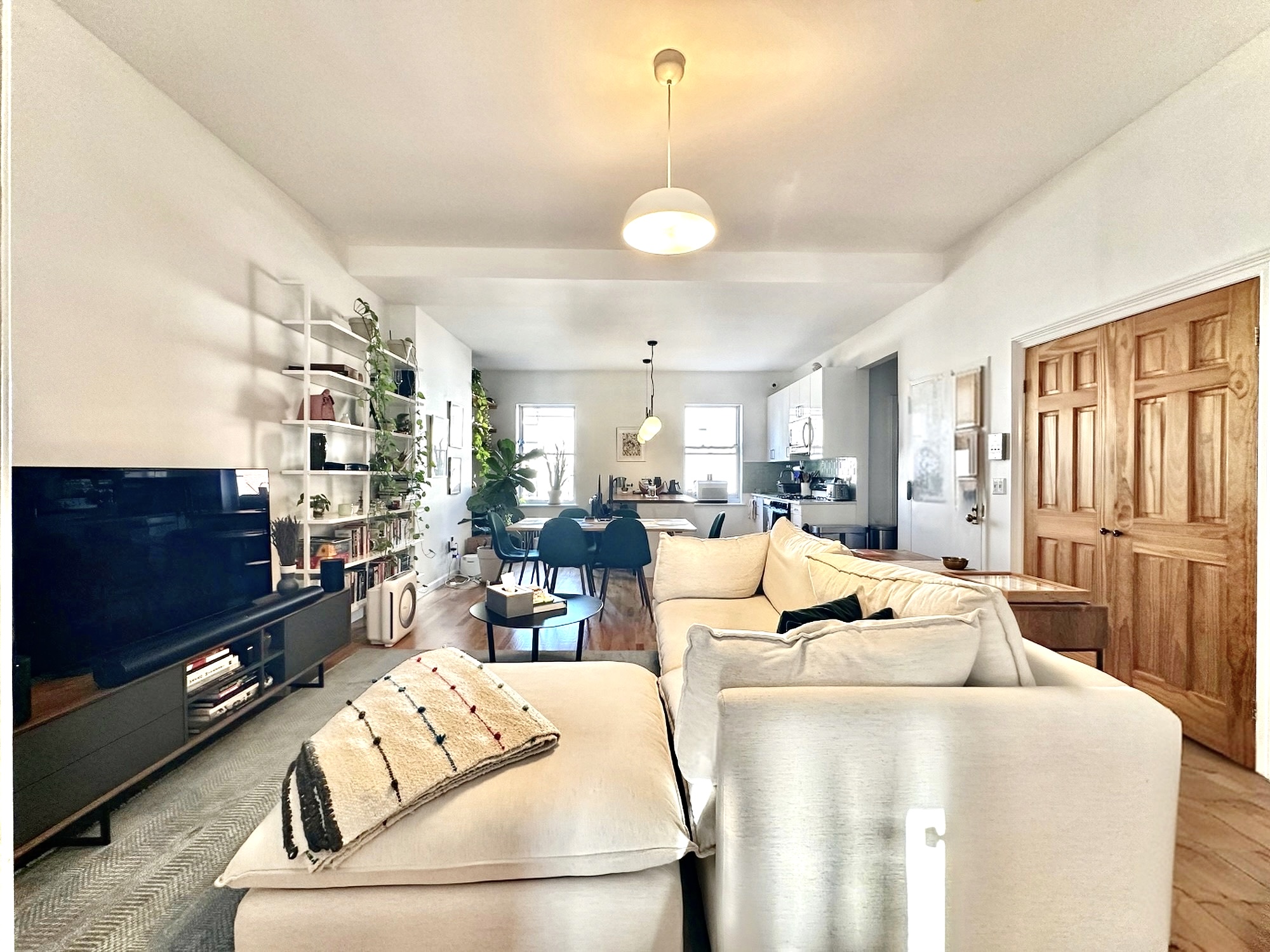 75 Warren Street, Unit 4 Brooklyn, NY 11201 - Photo 5 of 11 a living room with furniture fireplace and flat screen tv