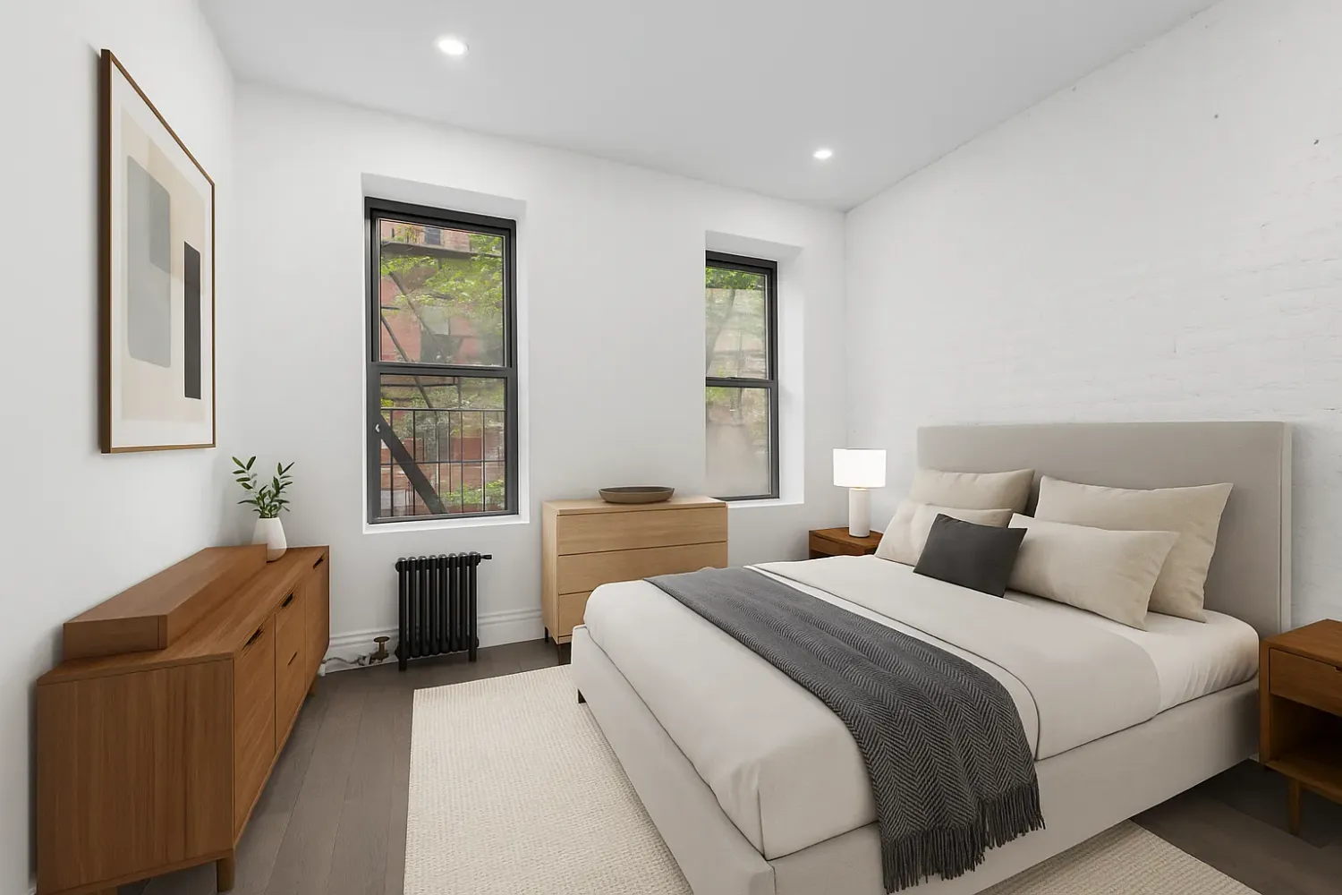 a bedroom with a bed and a couch