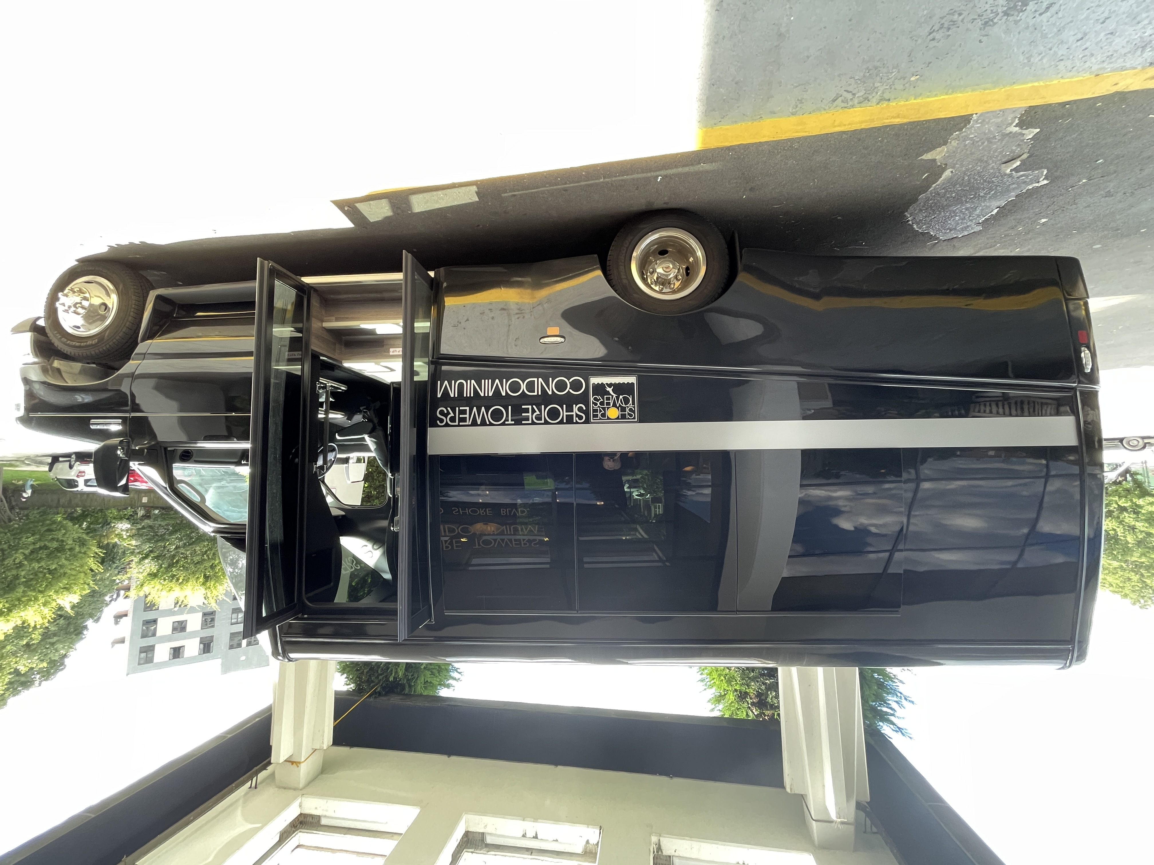 25-40 Shore Boulevard, Unit 6F Queens, NY 11102 - Photo 16 of 17 a car parked in front of building