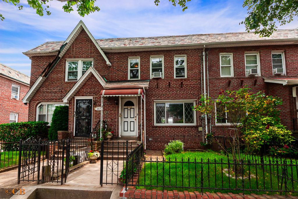 1221 Troy Avenue Brooklyn, NY 11203 - Photo 8 of 10 a front view of a house with garden