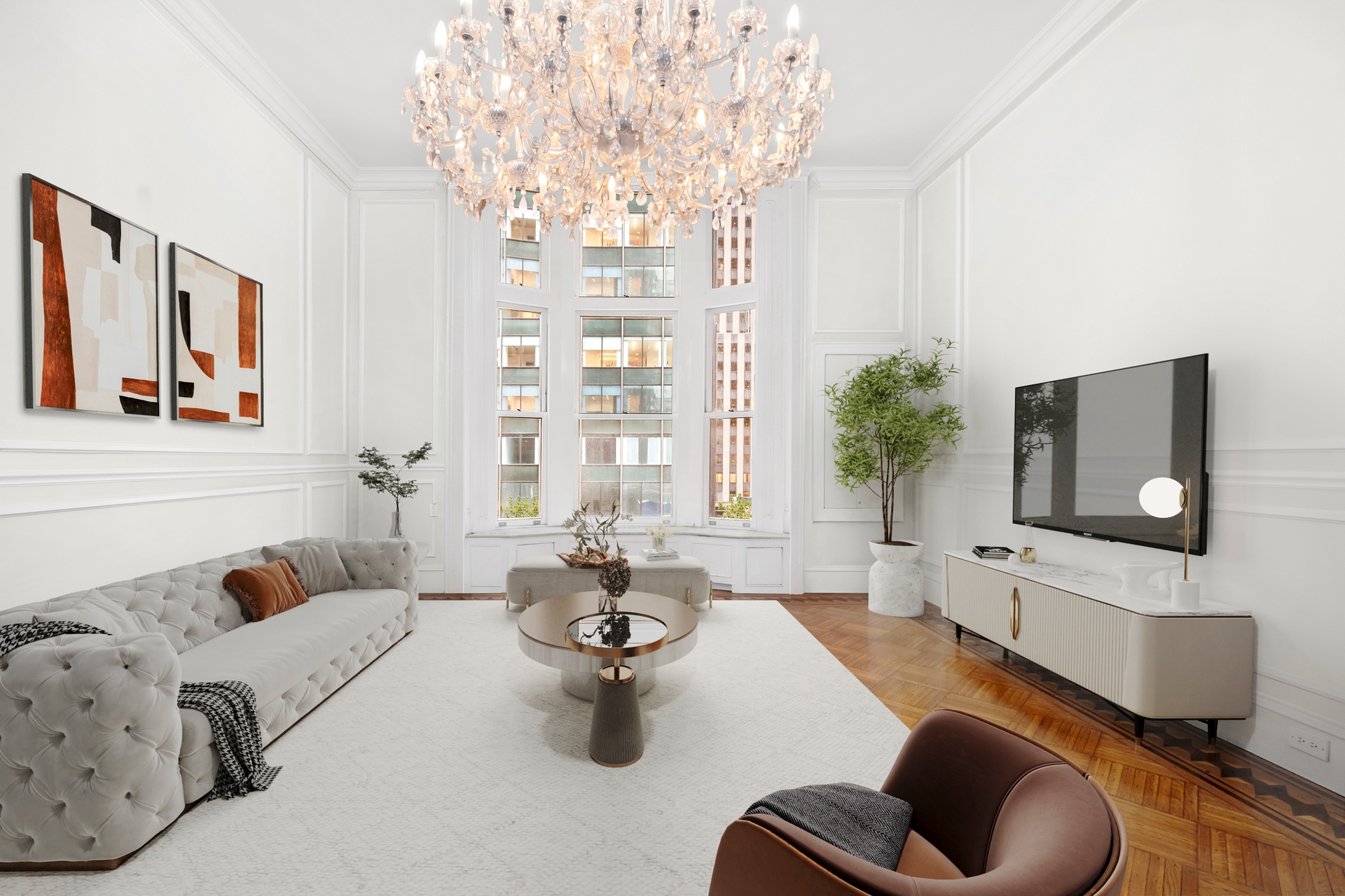 a living room with furniture and a flat screen tv