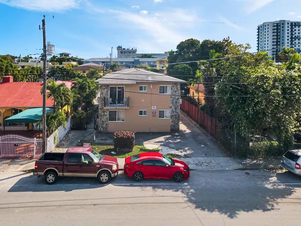 a car parked in front of a house