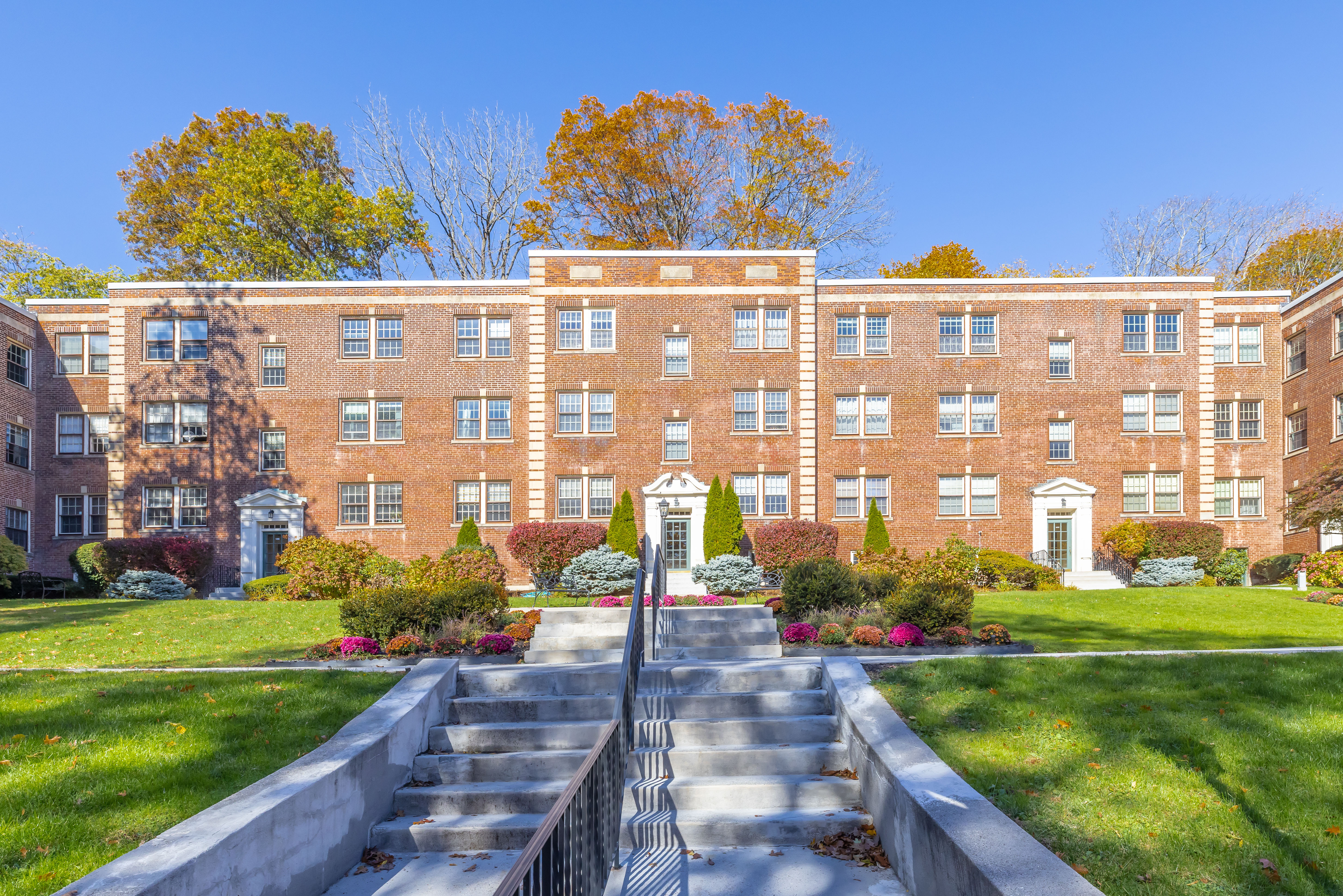 1490 Beacon Street, Unit 4 Brookline, MA 02446 - Photo 19 of 20 a front view of building with yard