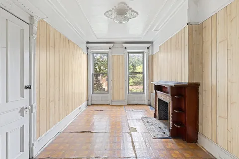 a view of livingroom with hardwood floor and hallway