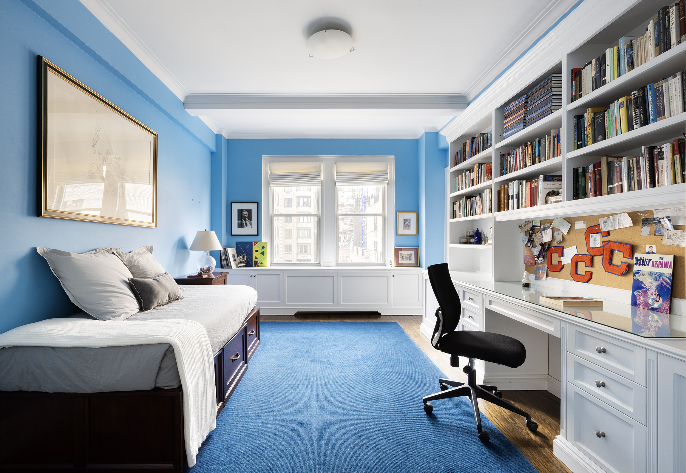 21 East 87th Street, Unit 10D Manhattan, NY 10128 - Photo 8 of 11 a bedroom with bed closet and window