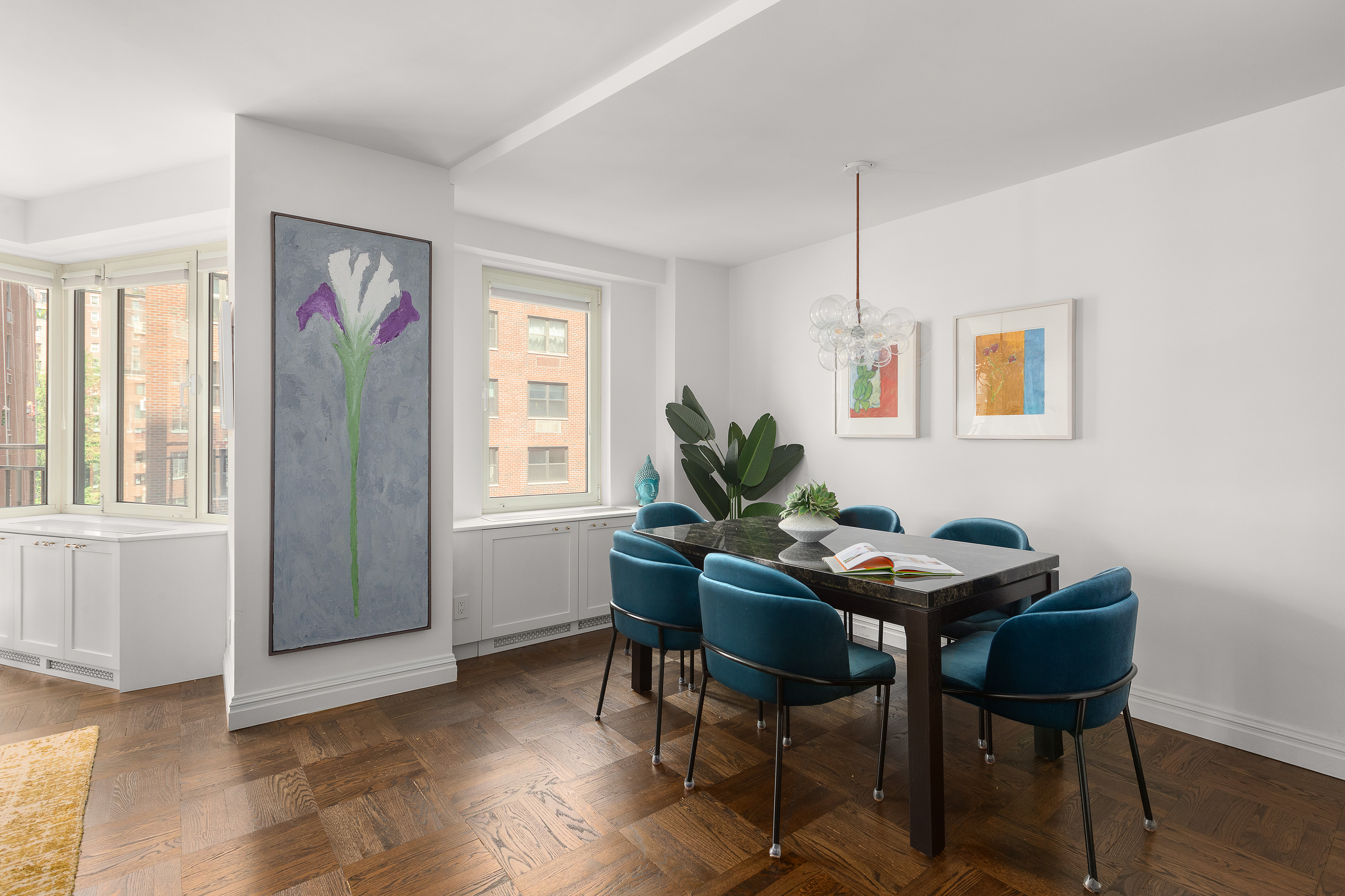 60 Sutton Place South, Unit 9AN Manhattan, NY 10022 - Photo 3 of 12 a dining room with furniture and window