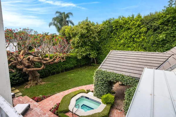 a backyard of a house with lots of green space
