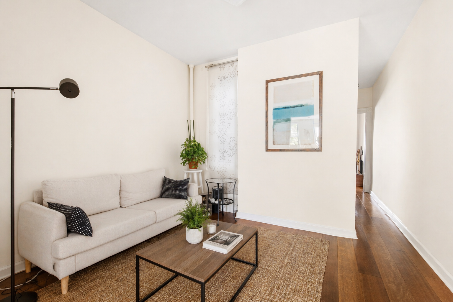 436 East 66th Street, Unit 4E Manhattan, NY 10065 - Photo 5 of 19 a living room with furniture and wooden floor