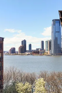 a view of a city with tall buildings