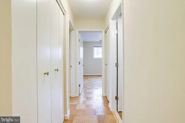 a view of an empty room with a window