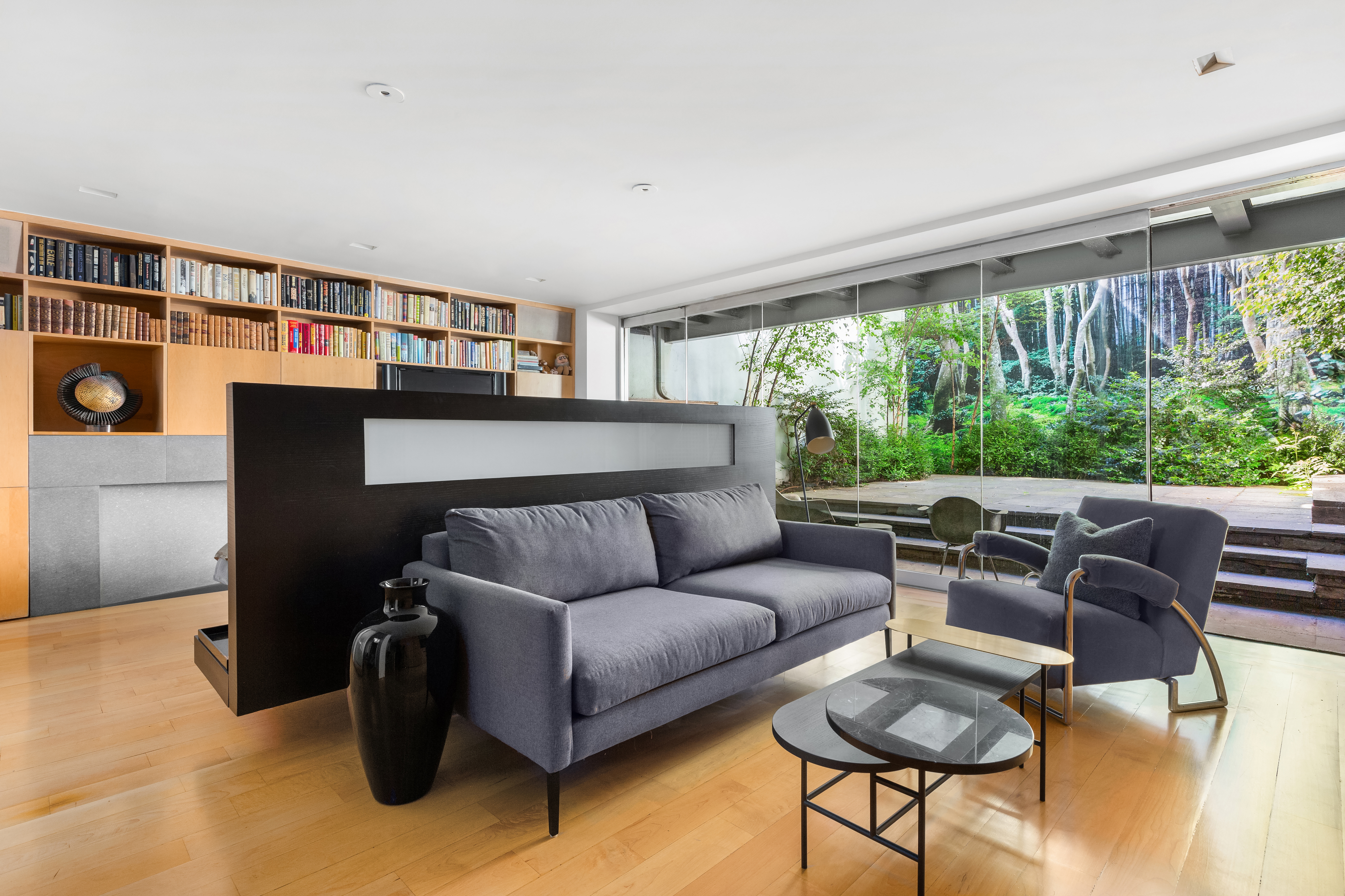 120 East 19th Street Manhattan, NY 10003 - Photo 15 of 33 a living room with furniture and a large window