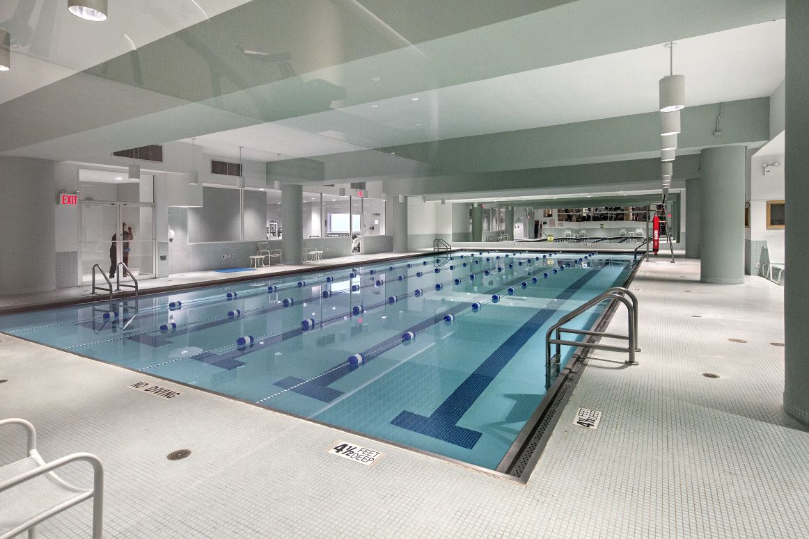 235 East 40th Street, Unit 11G Manhattan, NY 10016 - Photo 11 of 20 a view of a kitchen with stainless steel appliances granite countertop a sink and a counter top space