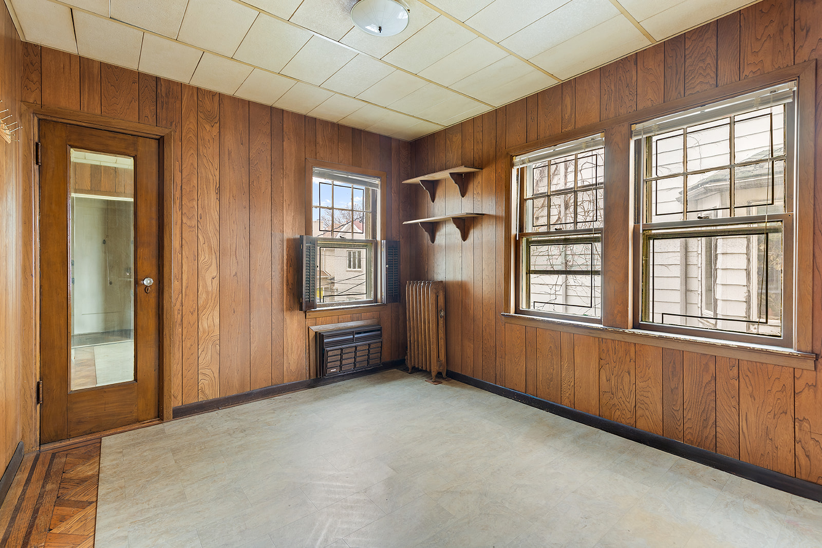 2411 Avenue M Brooklyn, NY 11210 - Photo 8 of 12 a view of an empty room with a window