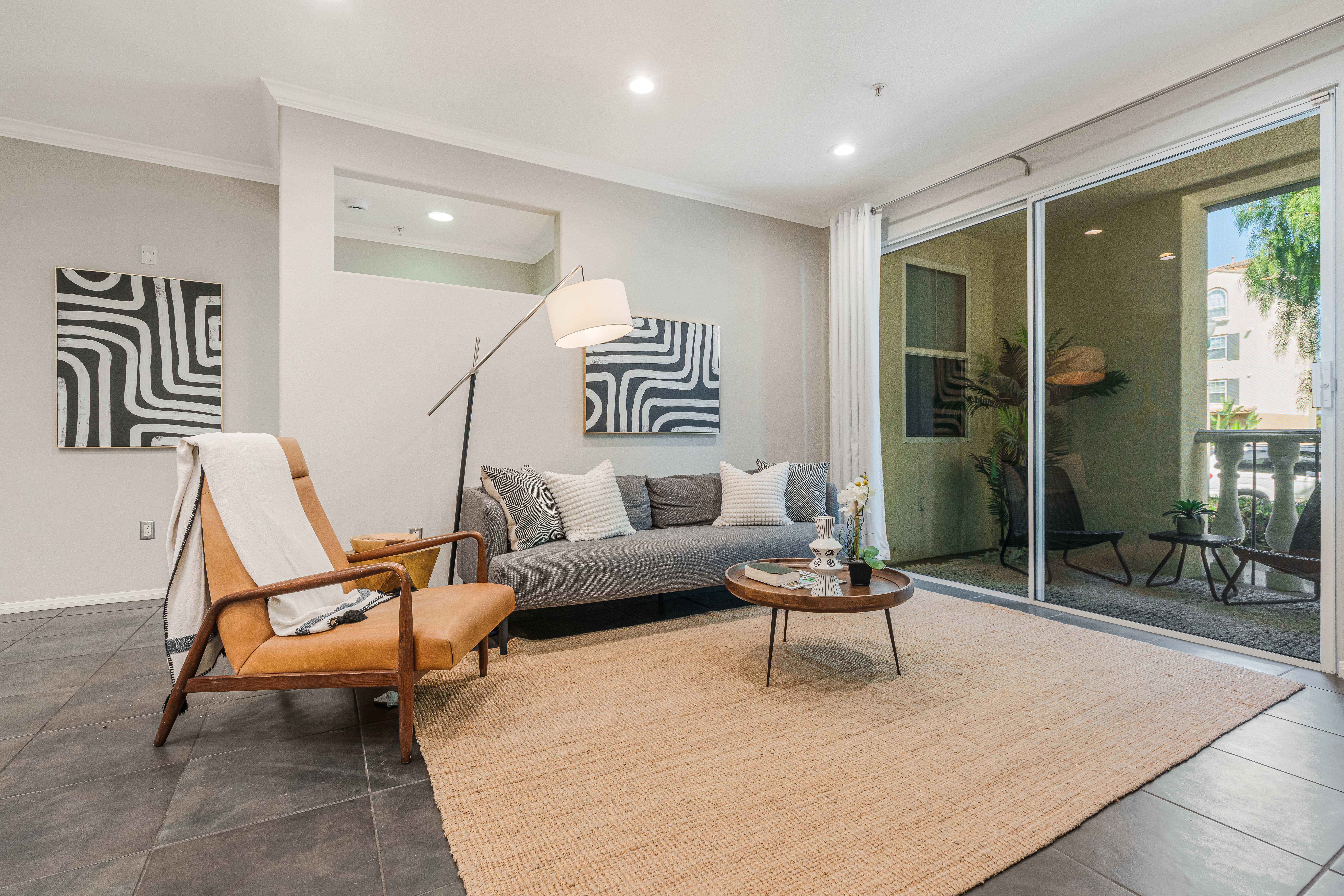 12963 West Runway Road Playa Vista, CA 90094 - Photo 2 of 39 a living room with furniture and white walls