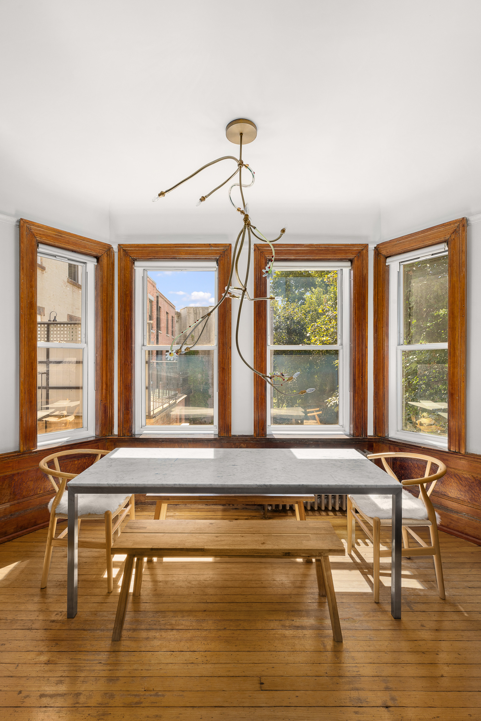 214 Carlton Avenue, Unit 2 Brooklyn, NY 11205 - Photo 4 of 16 a living room filled with furniture and a large window