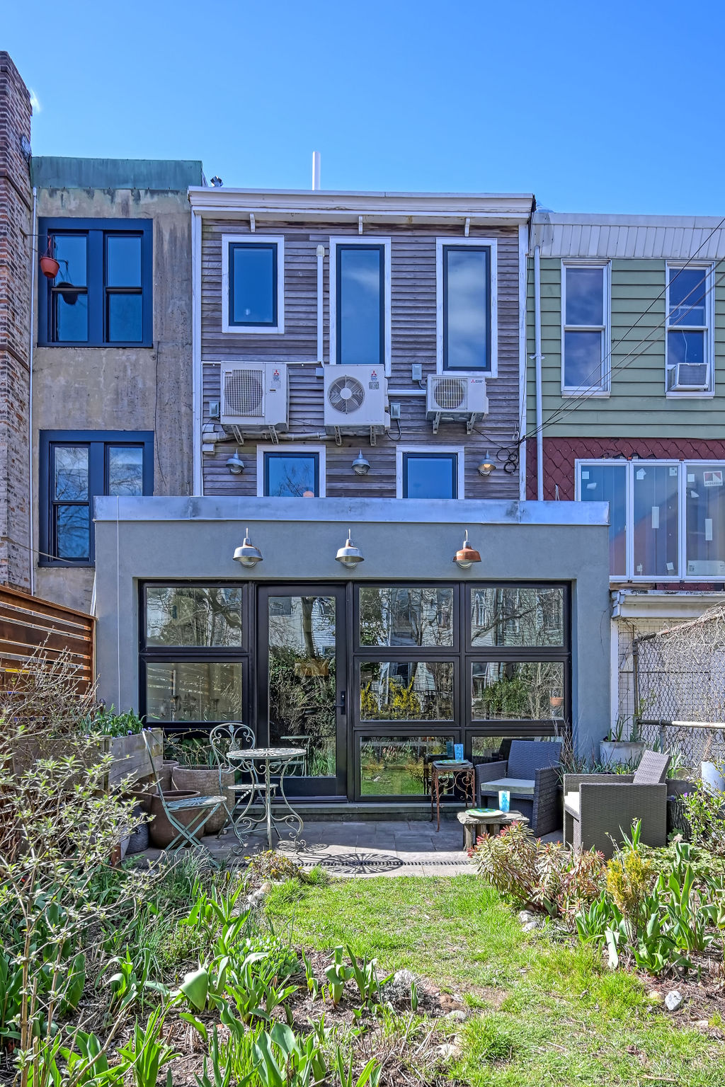 315 15th Street Brooklyn, NY 11215 - Photo 21 of 25 a view of a building with a chairs in a patio