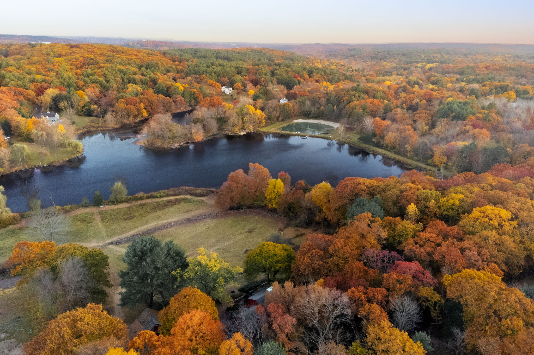 59 Conant Road Lincoln, MA 01773 - Photo 33 of 47 an aerial view of a houses with a lake