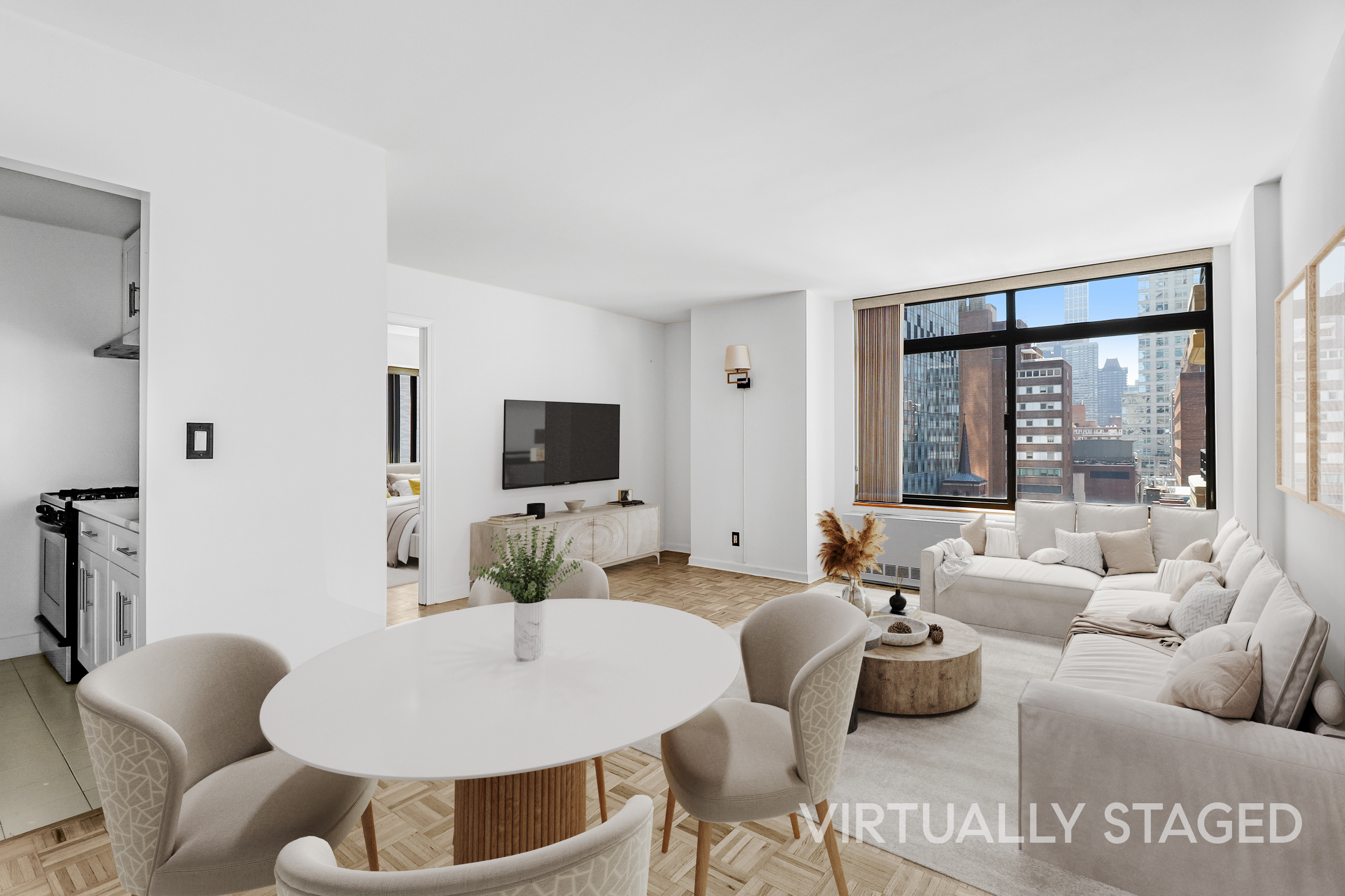 400 East 70th Street, Unit 1008 Manhattan, NY 10021 - Photo 1 of 15 a living room with furniture and a flat screen tv