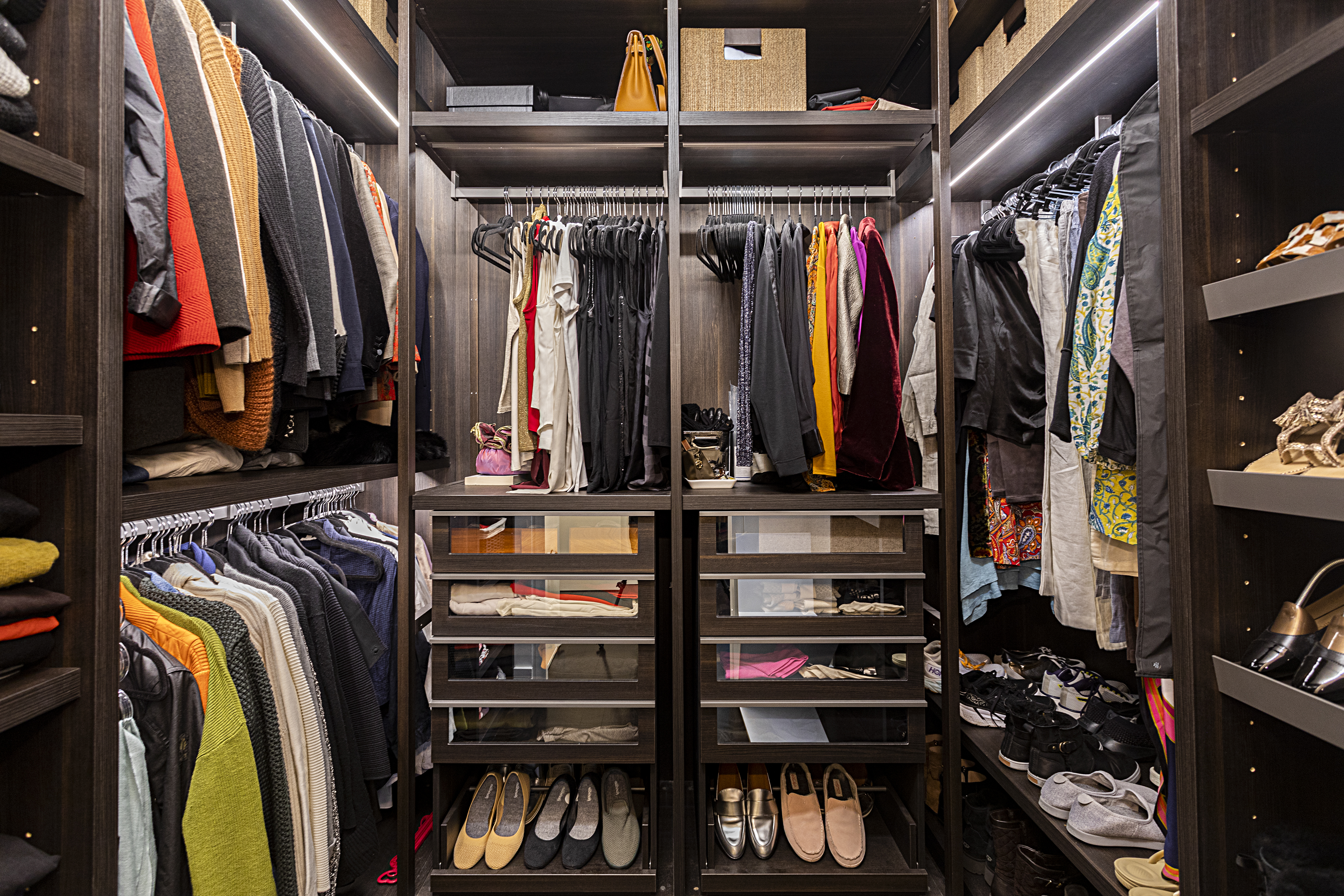 388 West Broadway, Unit 2 Manhattan, NY 10012 - Photo 16 of 27 a view of walk in closet with clothes and shoes