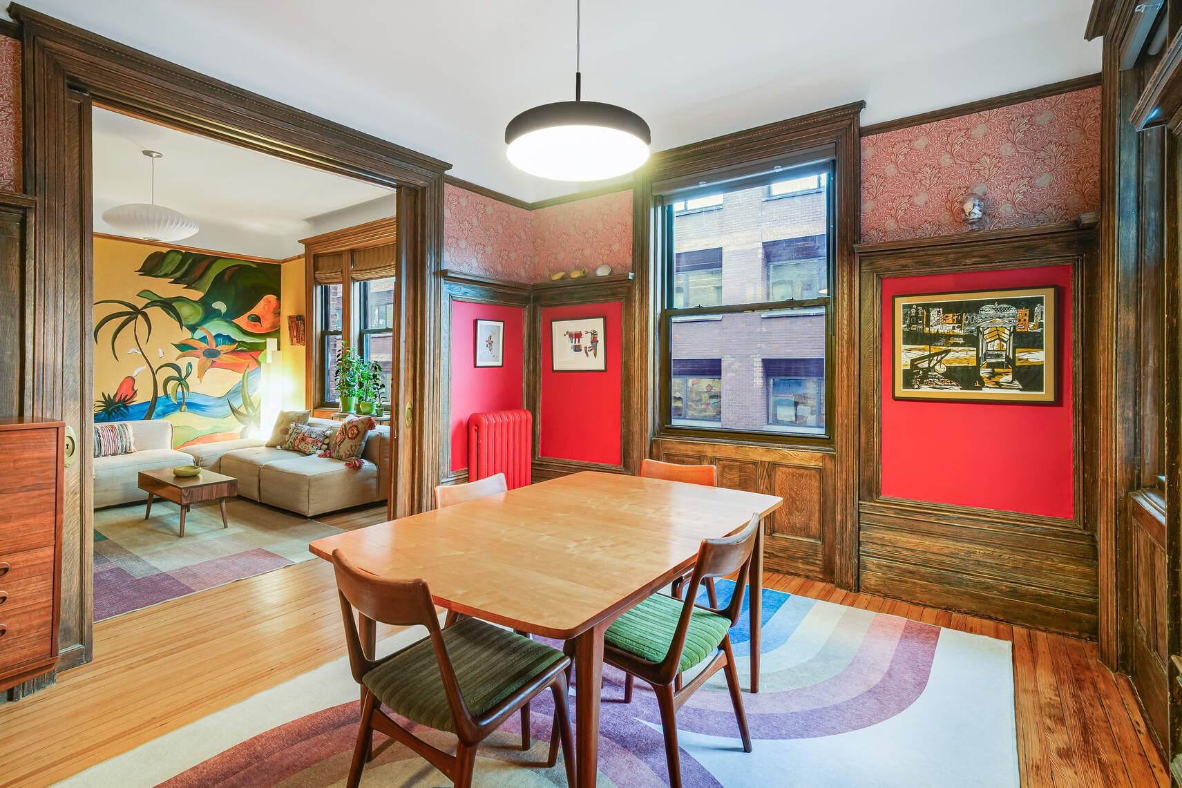 605 West 111th Street, Unit 43 Manhattan, NY 10025 - Photo 10 of 21 a view of a dining room with furniture a chandelier and wooden floor