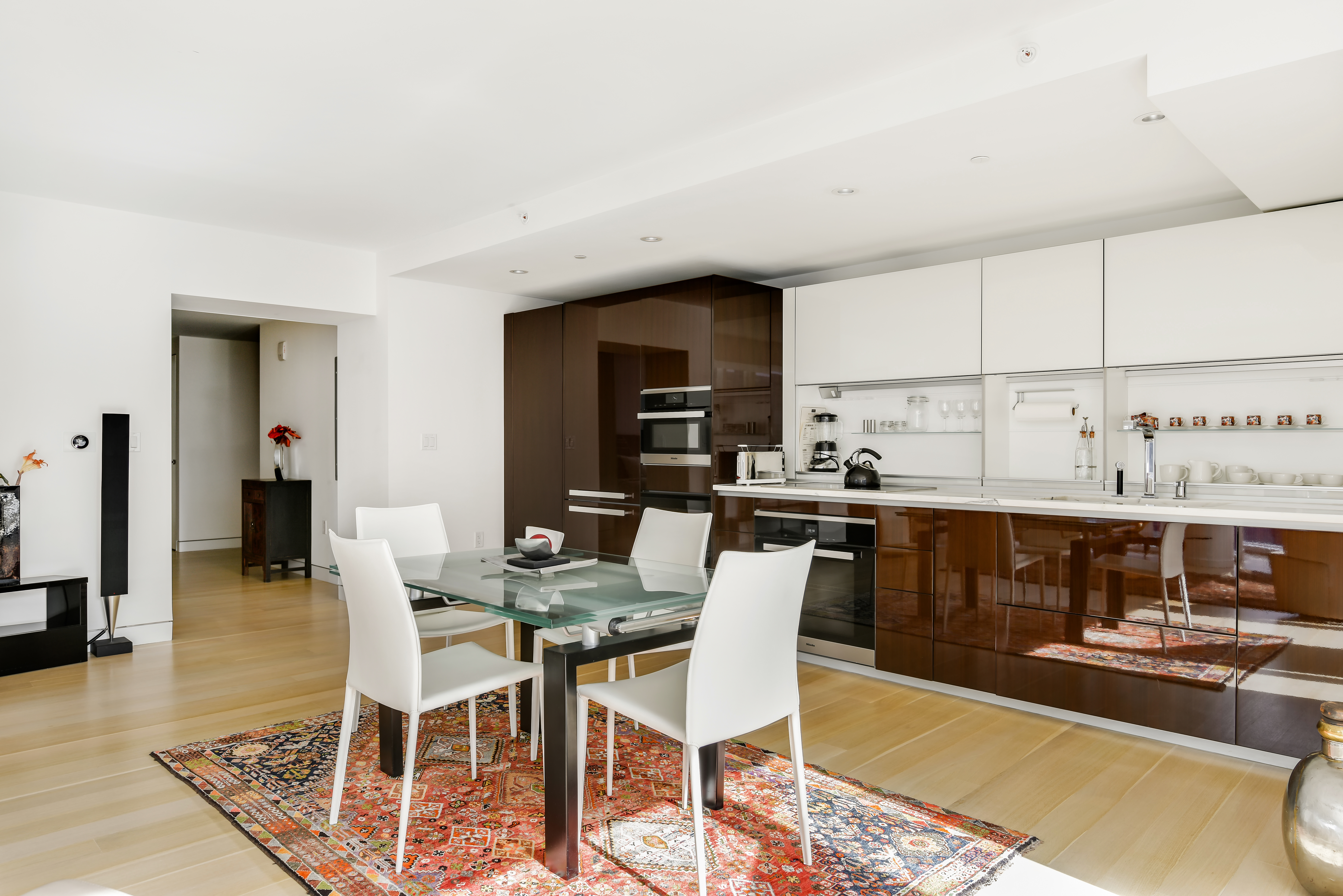 135 West 52nd Street, Unit 23C Manhattan, NY 10019 - Photo 7 of 19 a view of a dining room with furniture