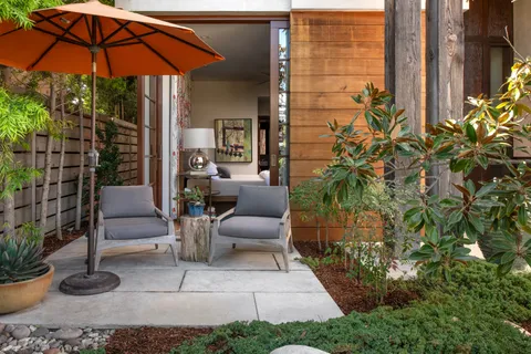 a view of a living room with gym equipment