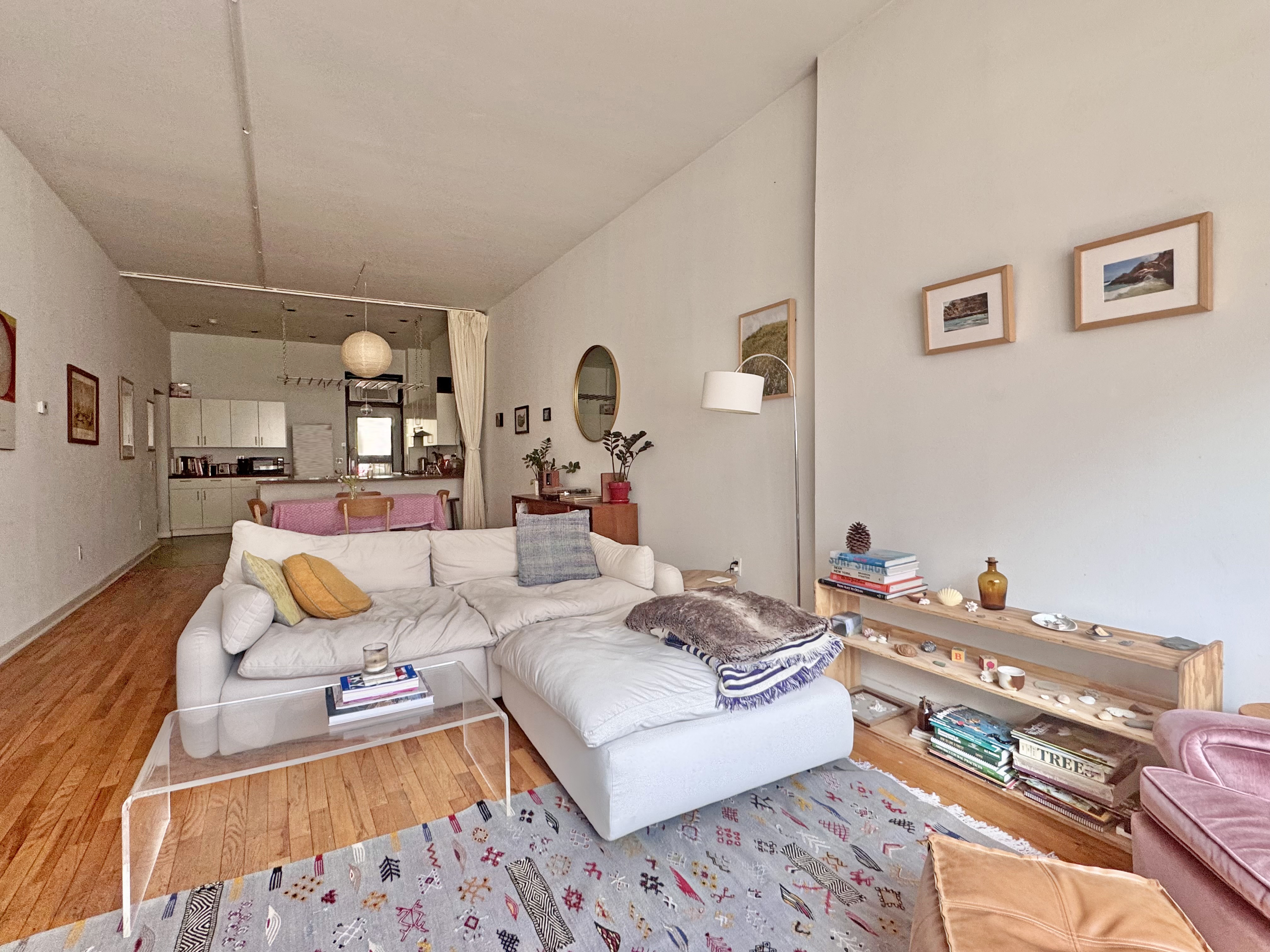 658 Classon Avenue Brooklyn, NY 11238 - Photo 1 of 15 a living room with furniture and wooden floor