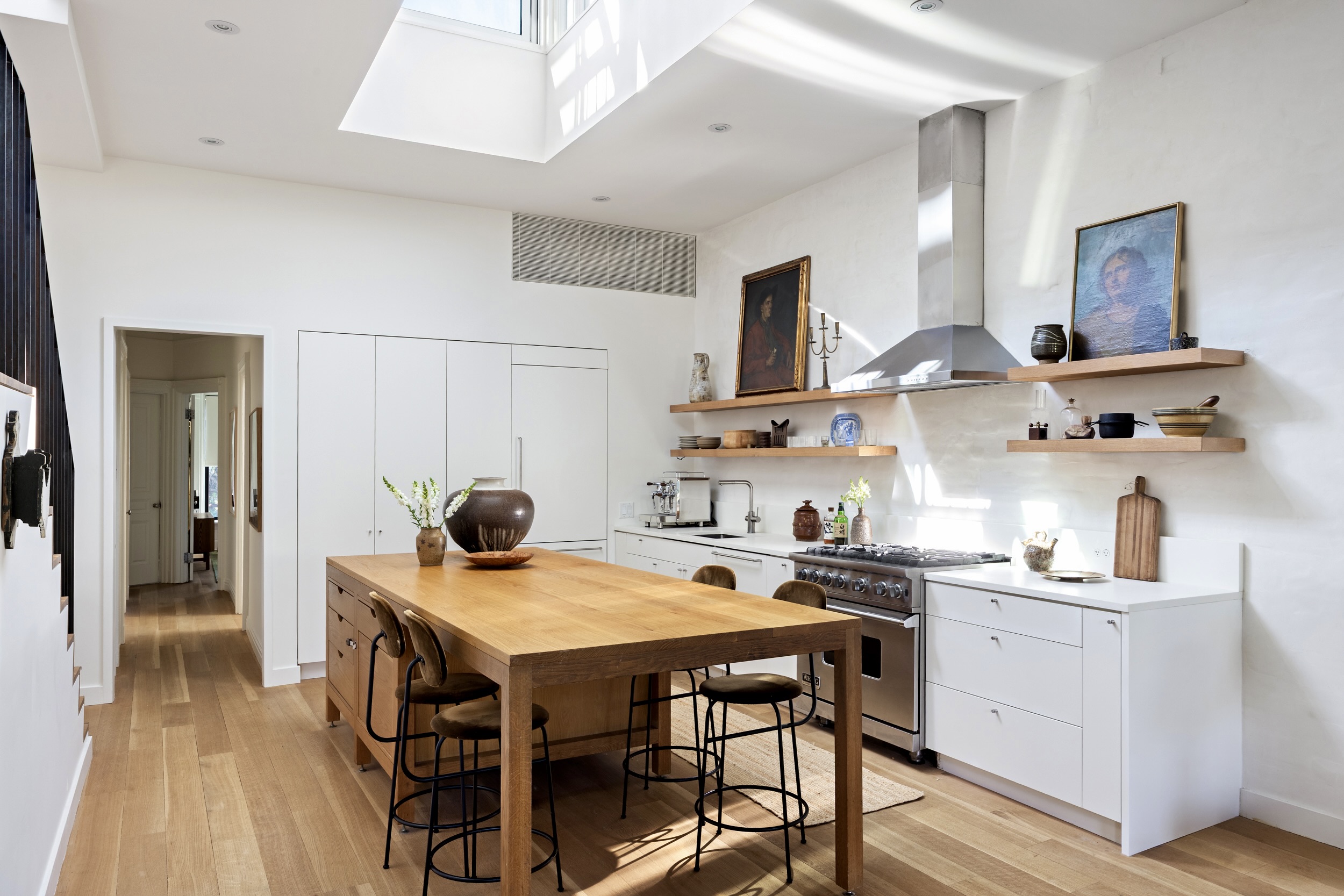 134 Berkeley Place, Unit 3 Brooklyn, NY 11217 - Photo 8 of 30 a kitchen with a dining table and chairs